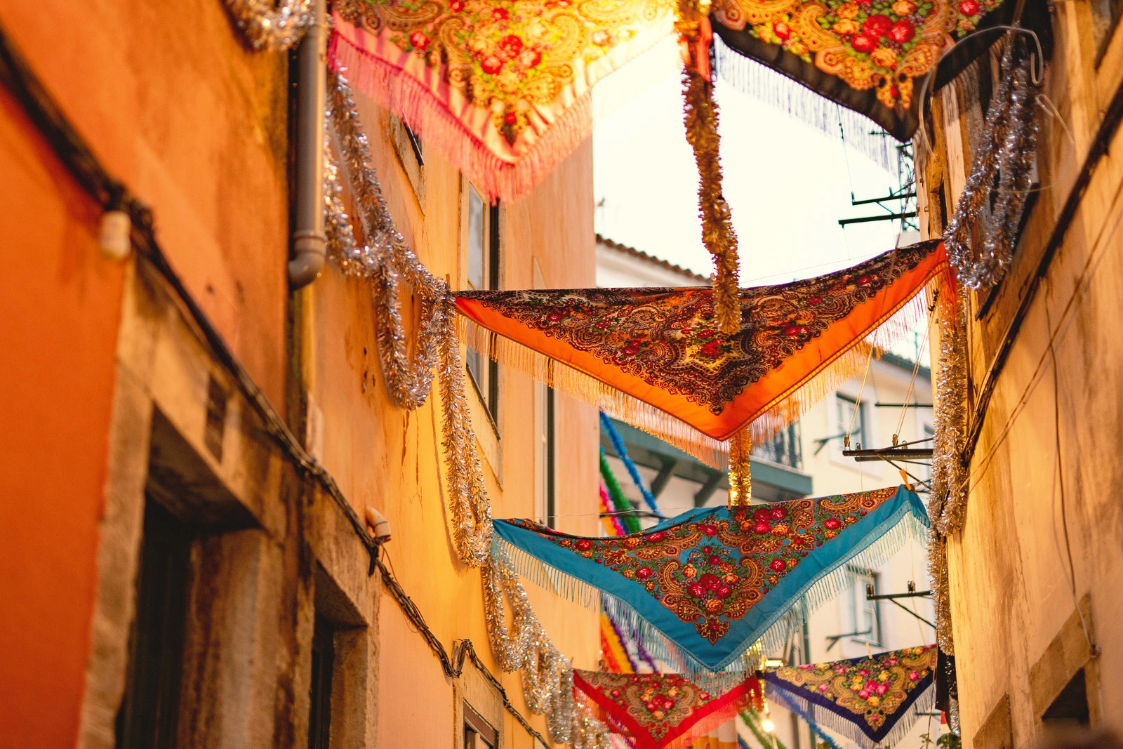 person holding green glass bottle