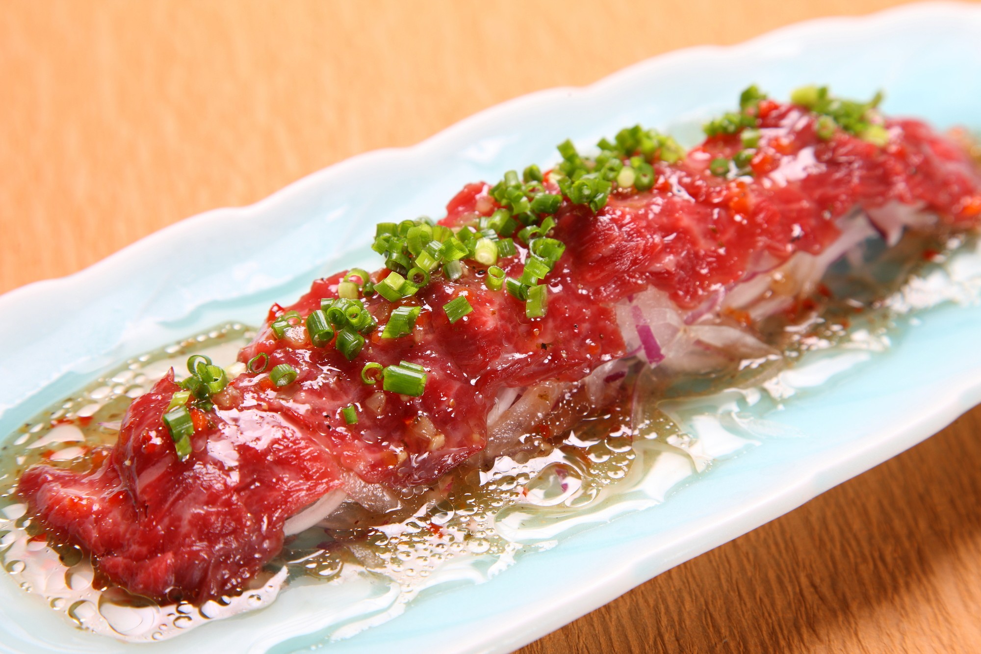 Shrimp ceviche with lime and toasted bread.