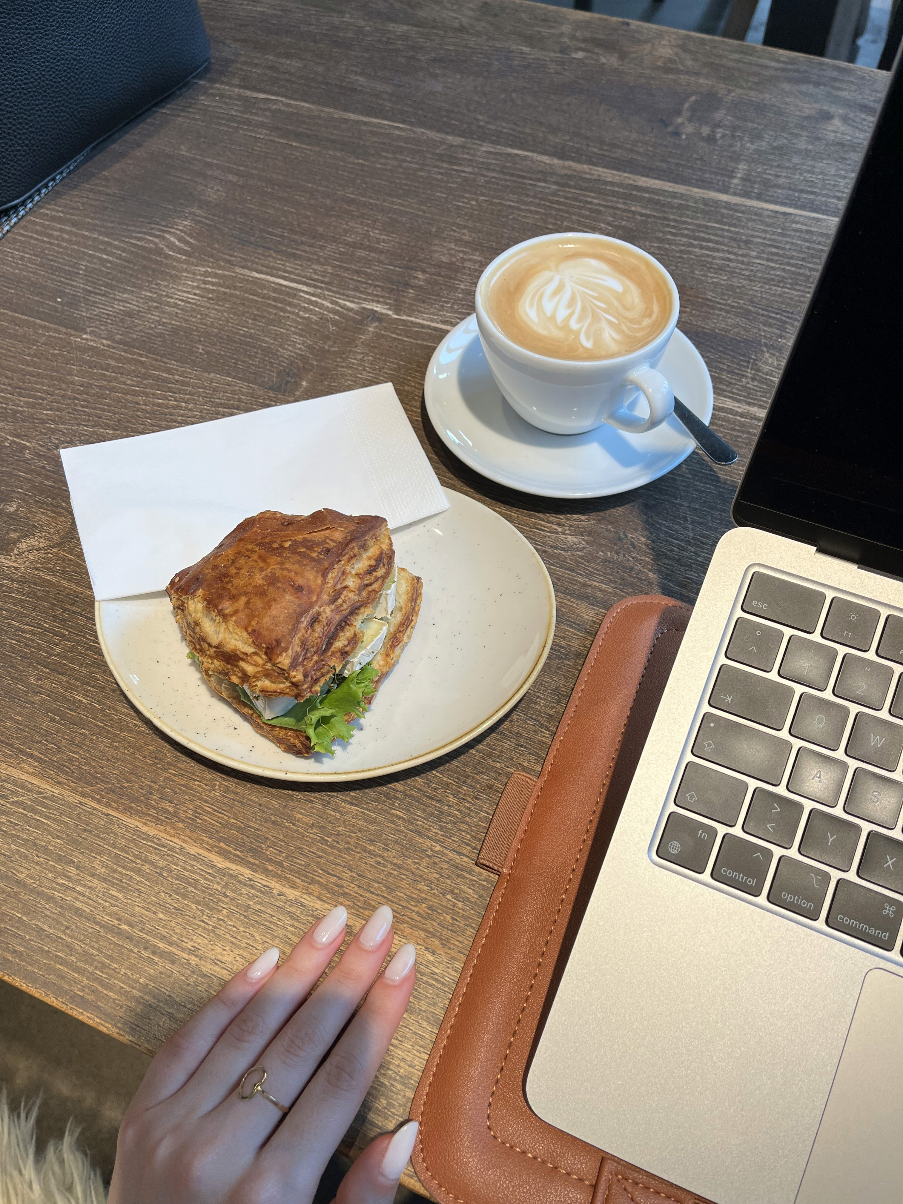 people in a large building with Tate Modern in the background