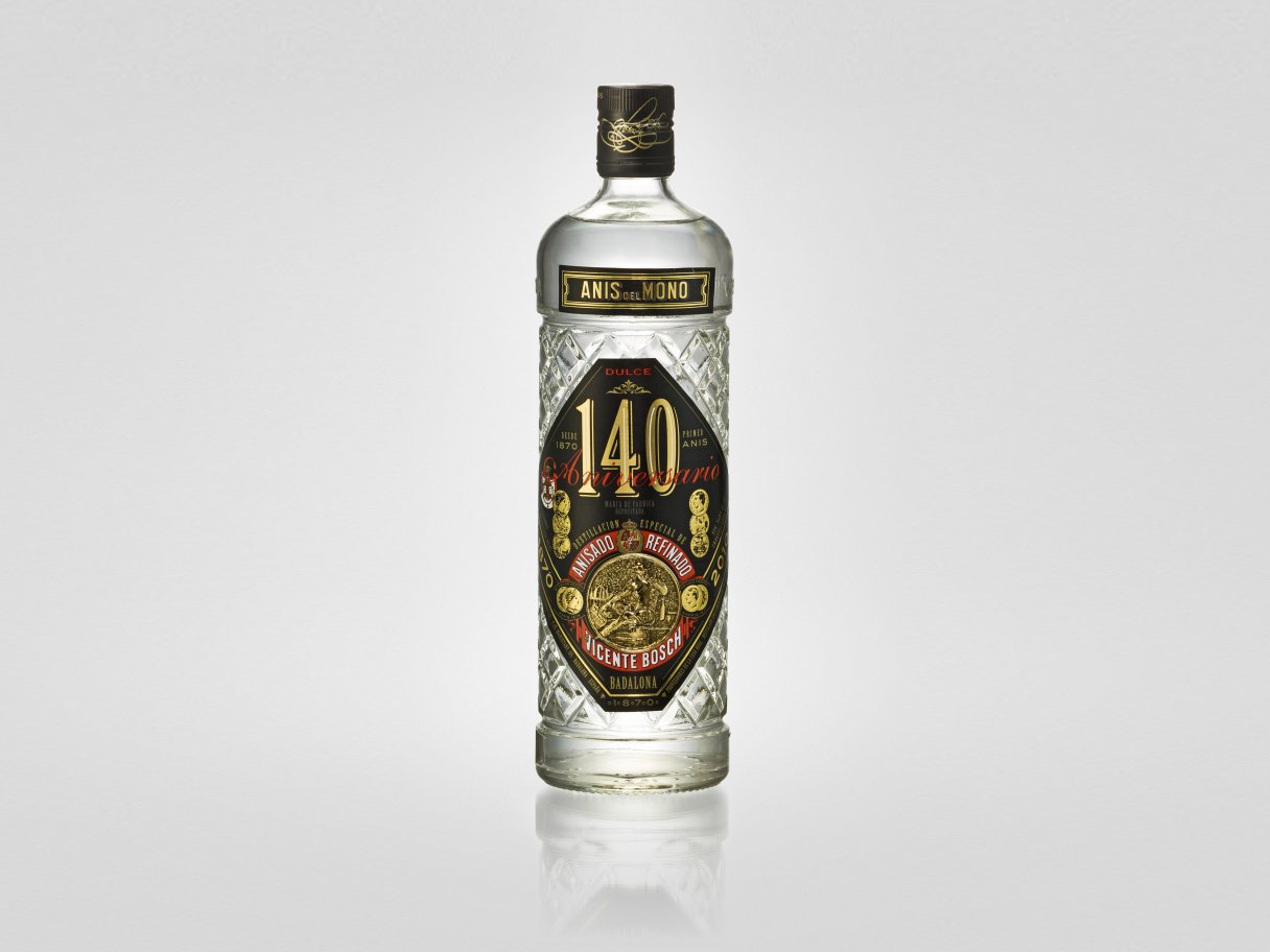 Rooftops of a coastal town with the sea in background