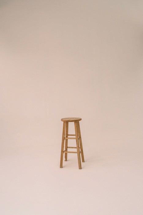infinity cyclorama wall in wooden photography stool