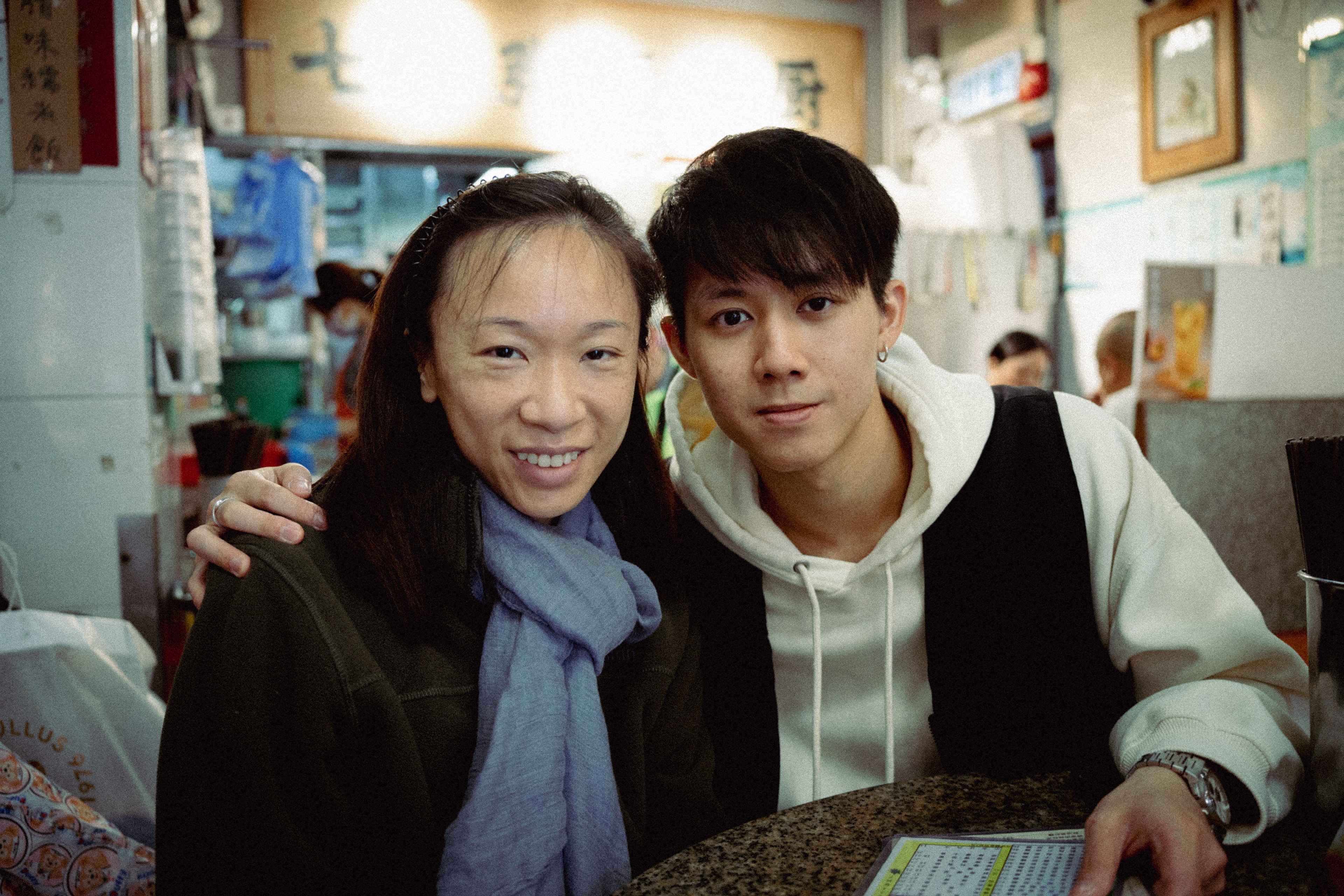 the skirts is moving by the wind that sister is wearing