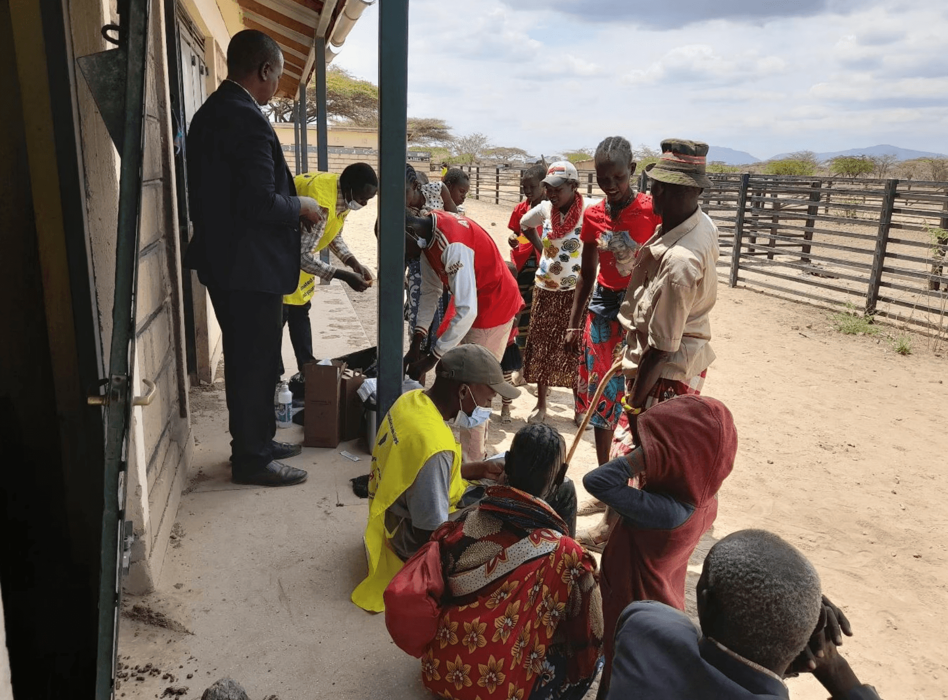 2 boys and girl playing soccer during daytime