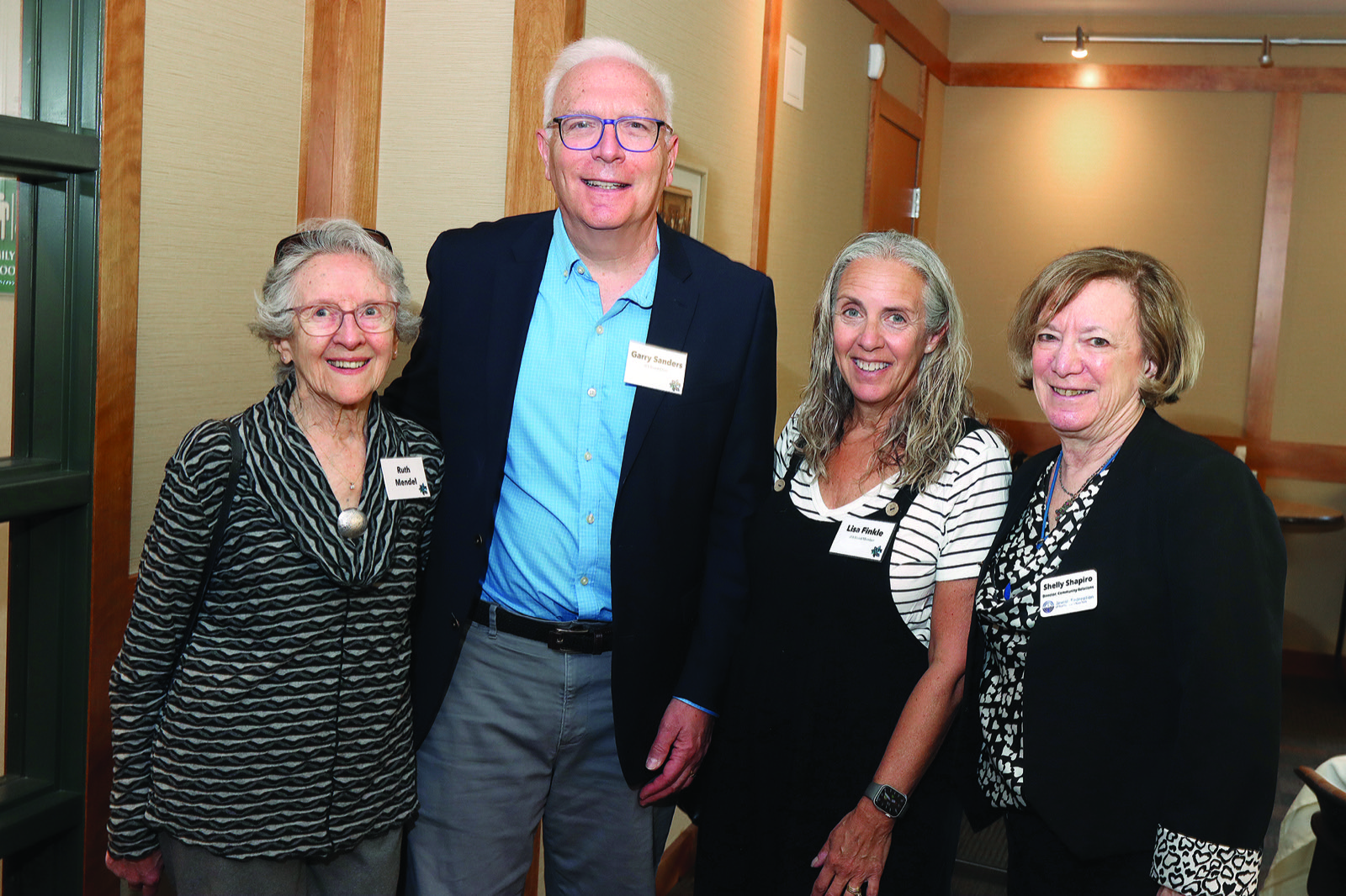 Ruth Facher Mendel, Survivor; Garry R. Sanders, JFS Board Chair; Lisa A. Finkle, JFS Board Member; Shelley Shapiro, Jewish Federation, Director of Community Relations [Credit: Joe Putrock]