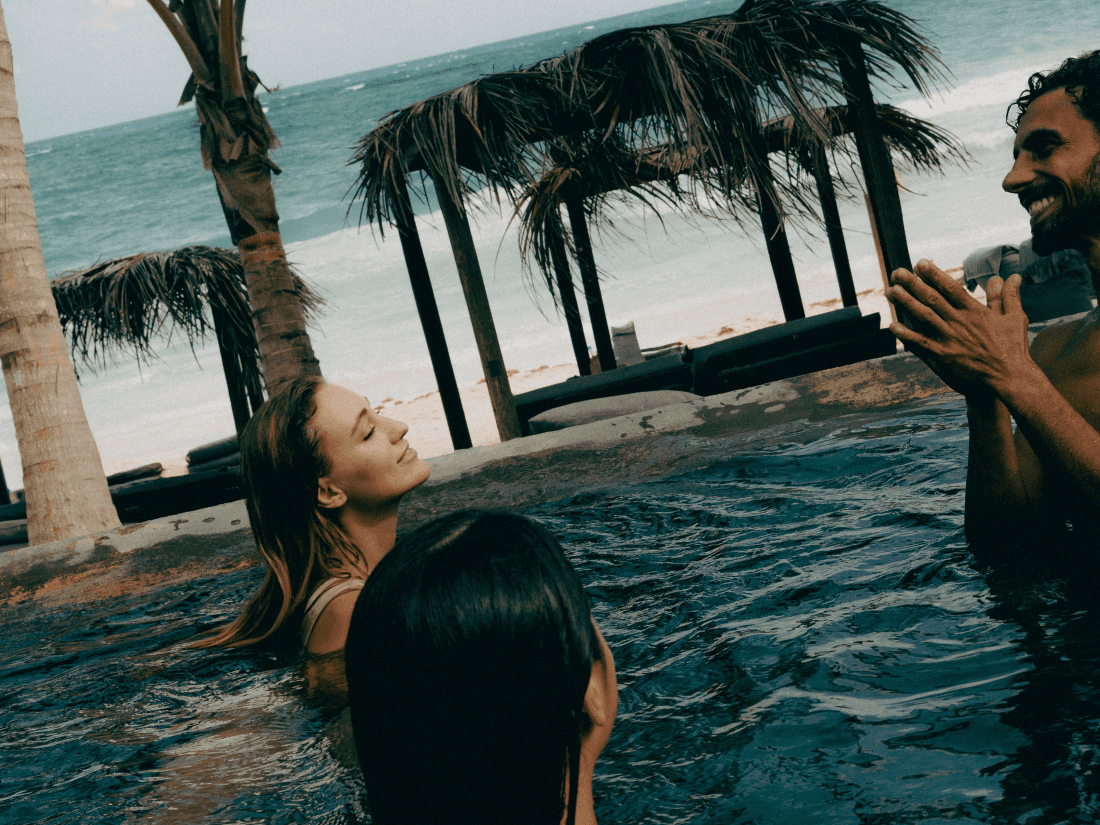 Deluxe Tent at Nômade Tulum featuring Moroccan-style cabin with large trees and jungle atmosphere.