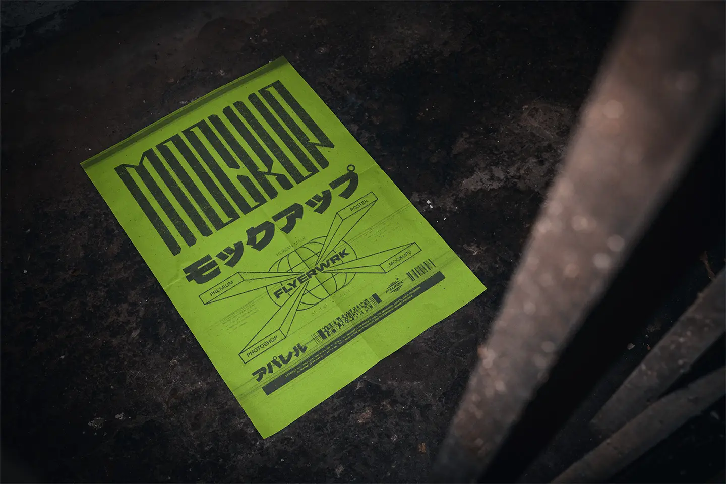 Basement A2 Poster Mockup displaying a vibrant neon green anti-design poster on a dark floor