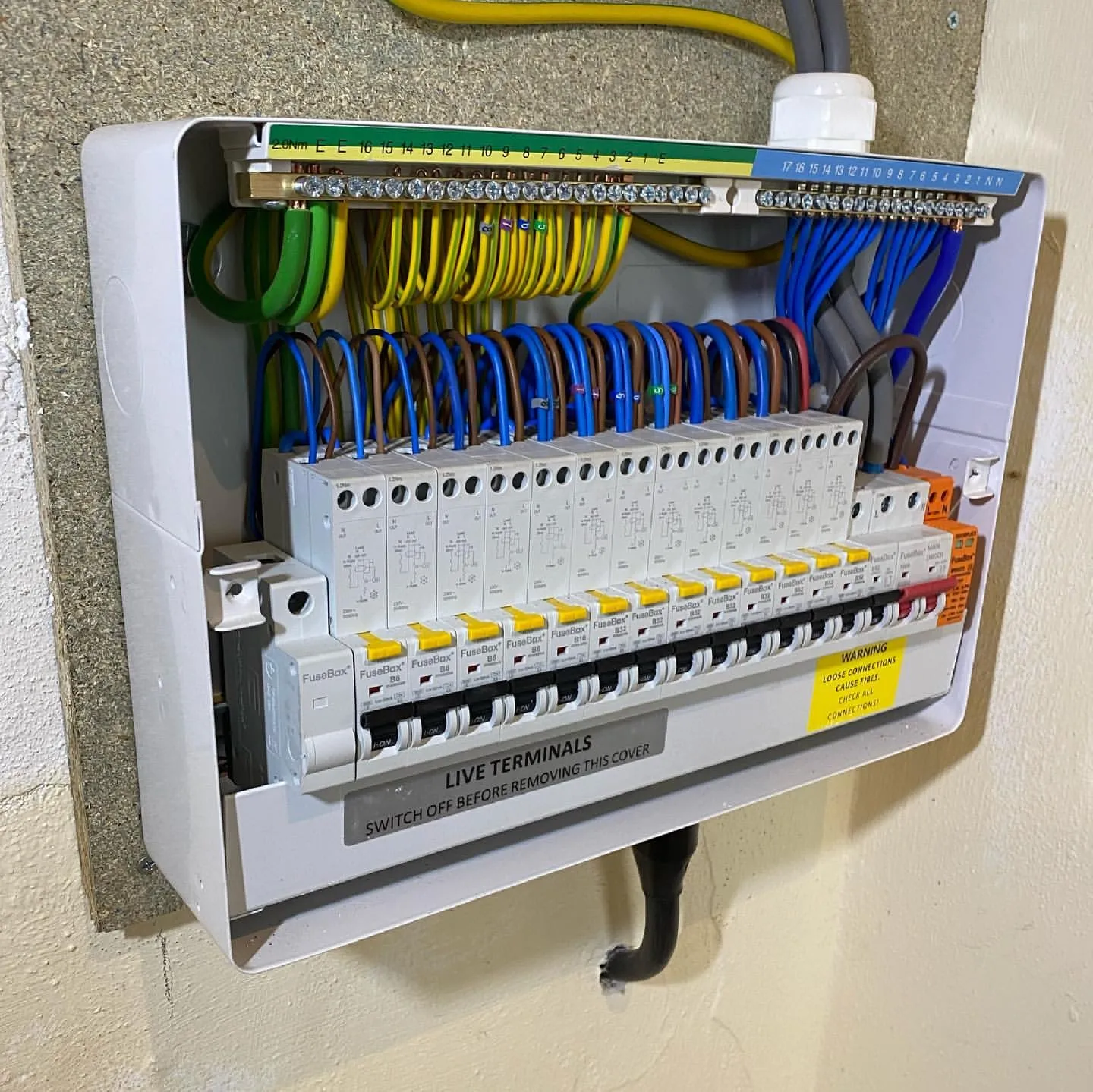 An electrician rewiring a property.