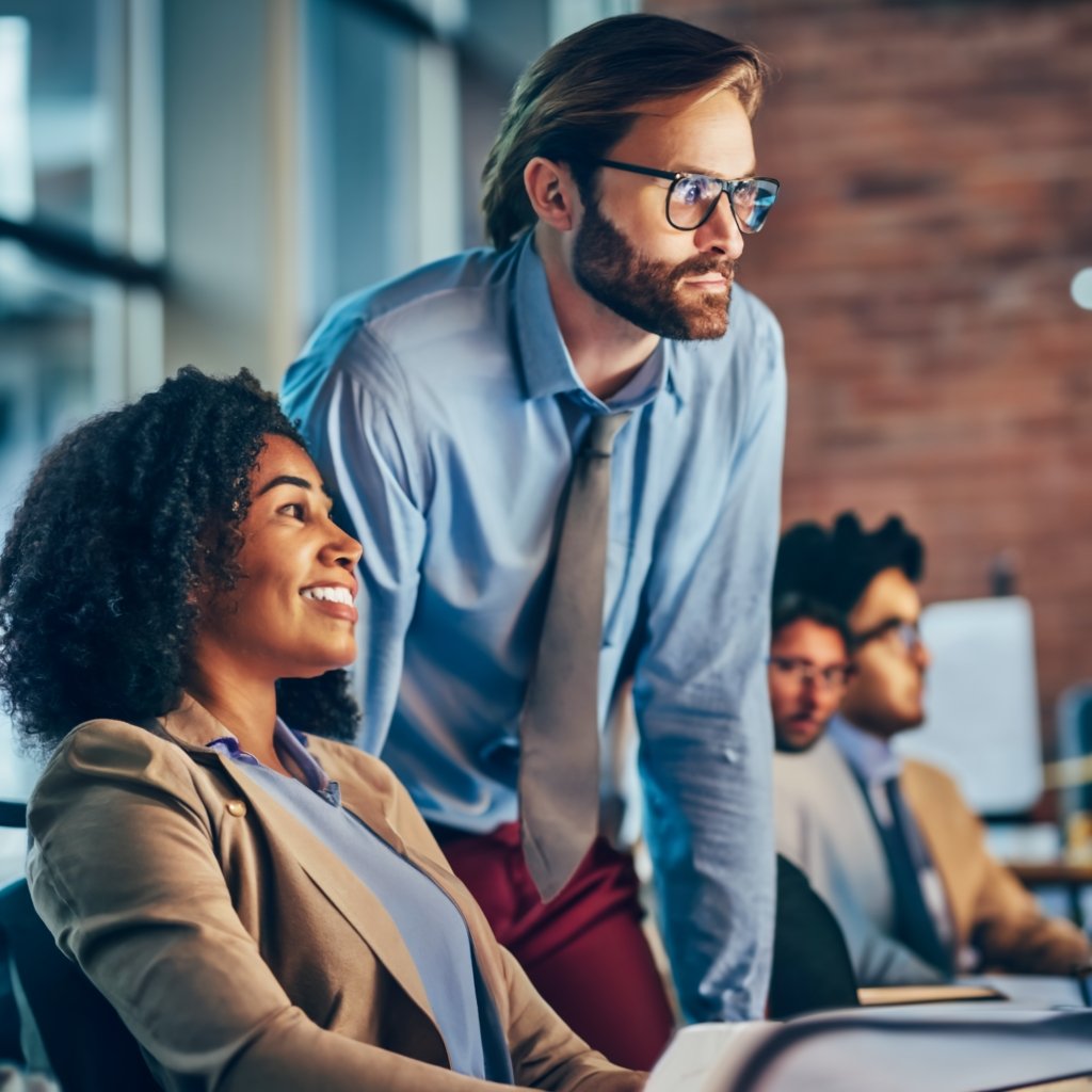 Skilled professional thriving in a collaborative and modern American workspace, exemplifying H1 Visa career opportunities.\