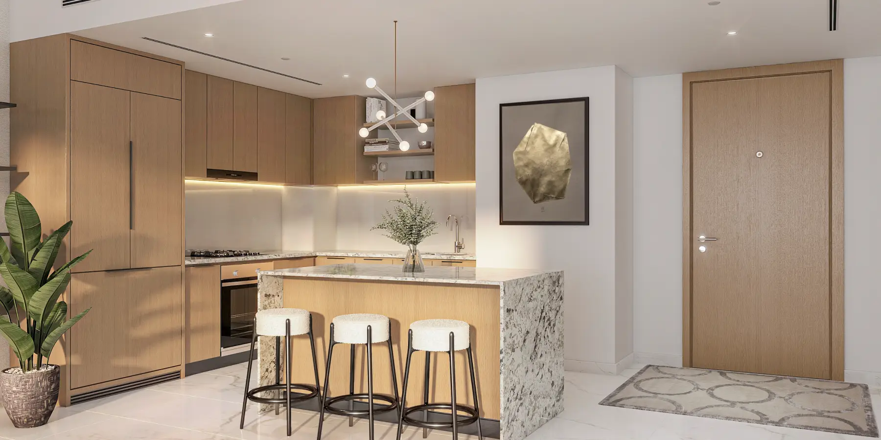 Interior view of a kitchen with a bar and dining space in Azizi Central, Dubai.