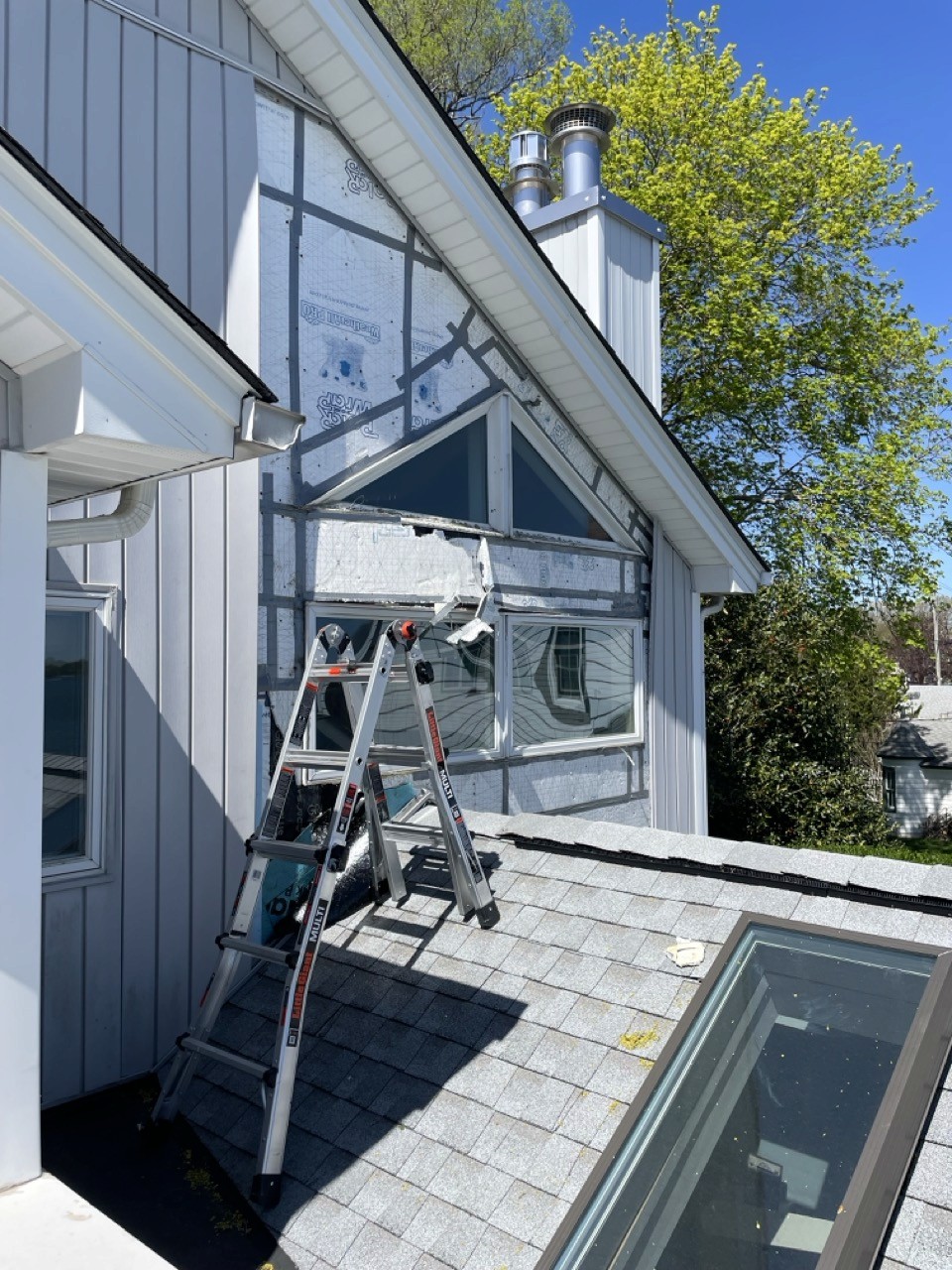 Removing the damaged window and rotted framing