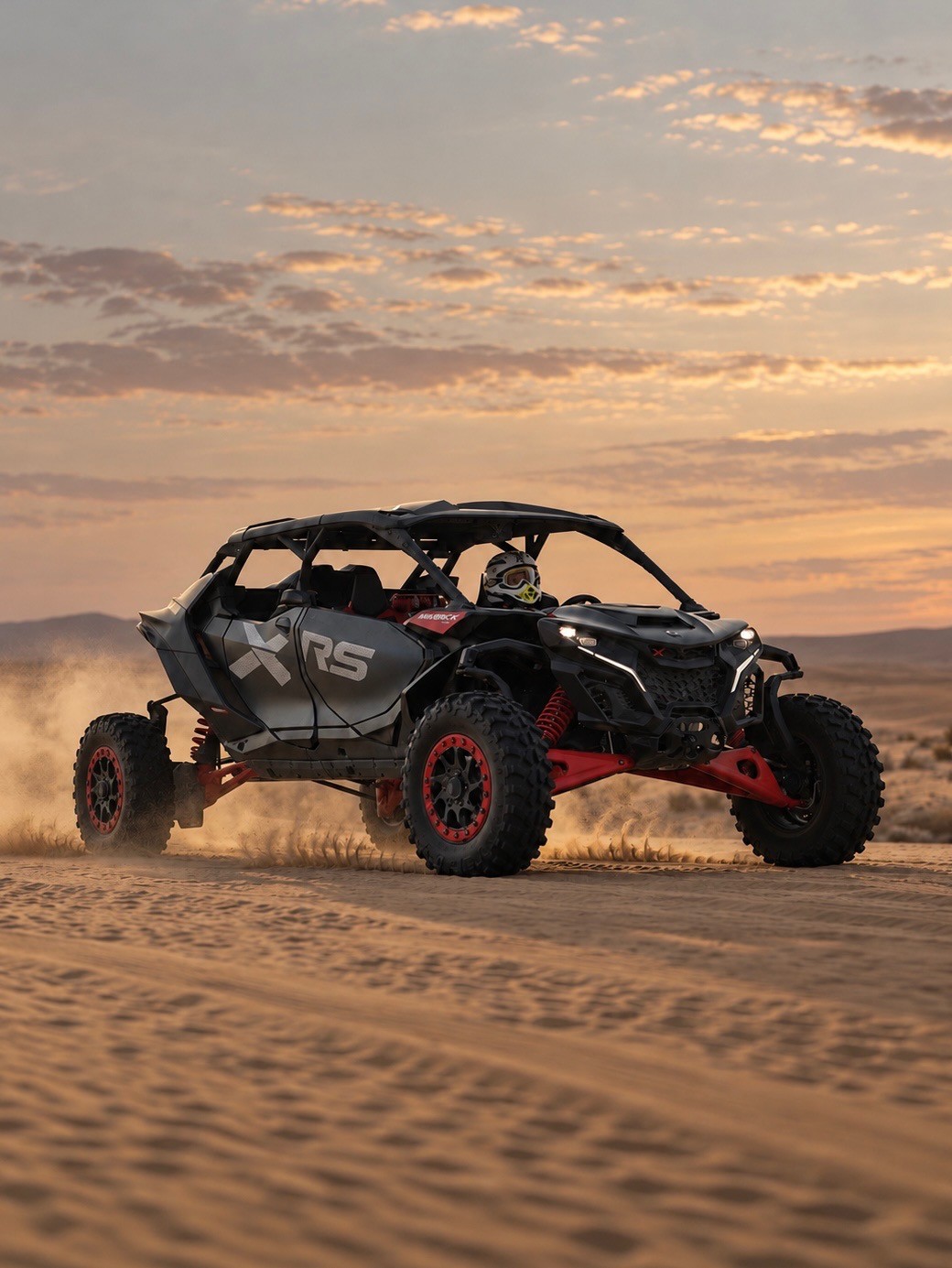 Can-Am dune buggy on the red dunes at a Dubai desert safari
