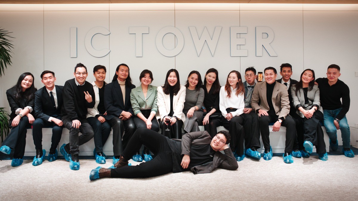 woman in gray hijab and gray coat