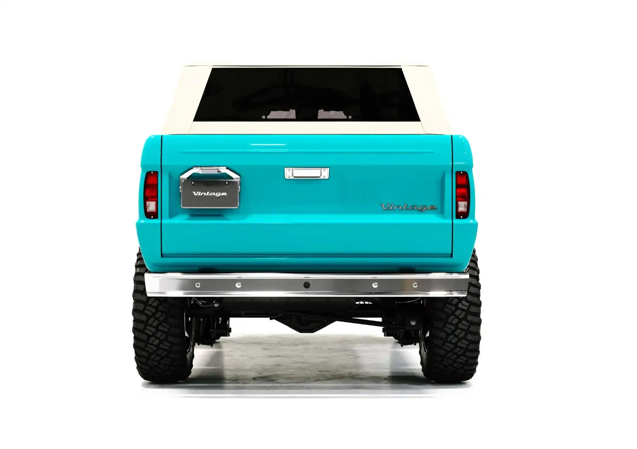 a person swimming in the water with grass