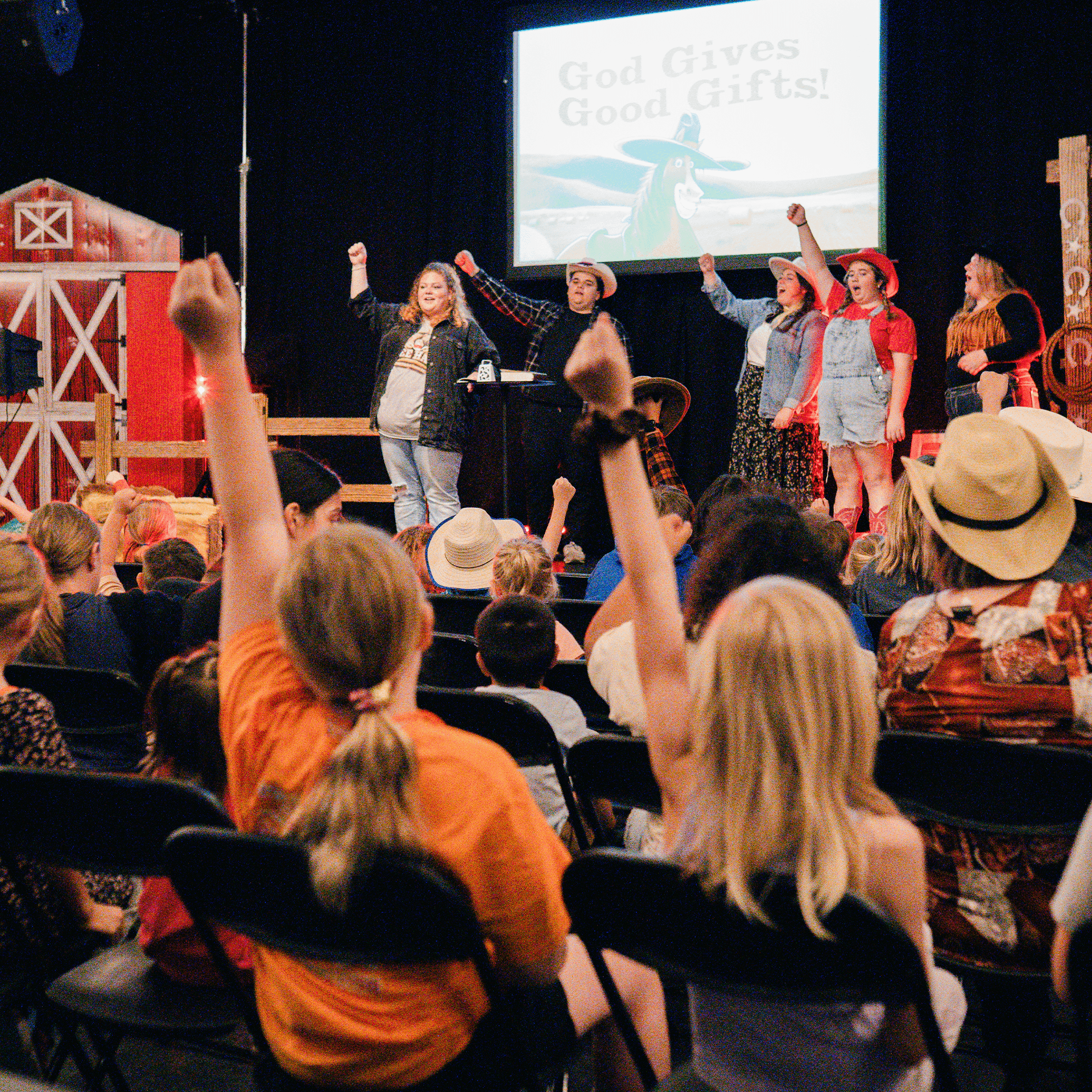 Kids worshipping at Vacation Bible School.