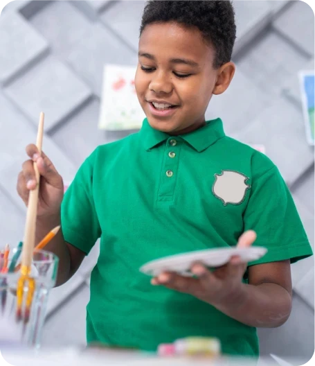 kid playing with colors