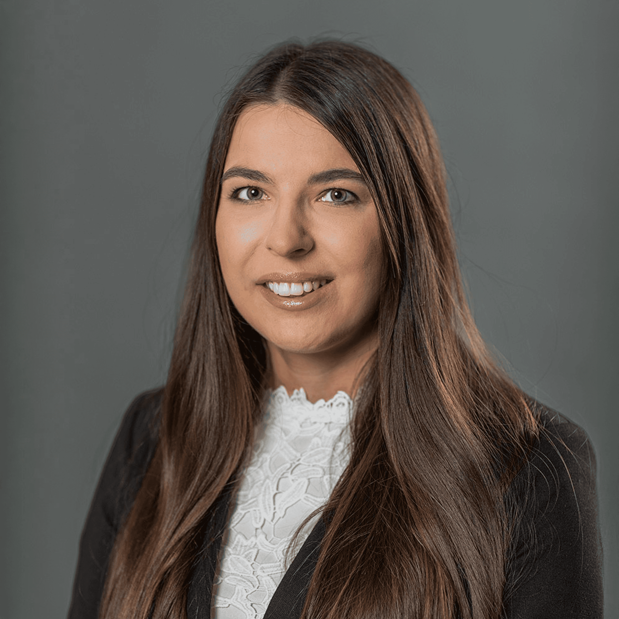 woman in white crew neck shirt smiling