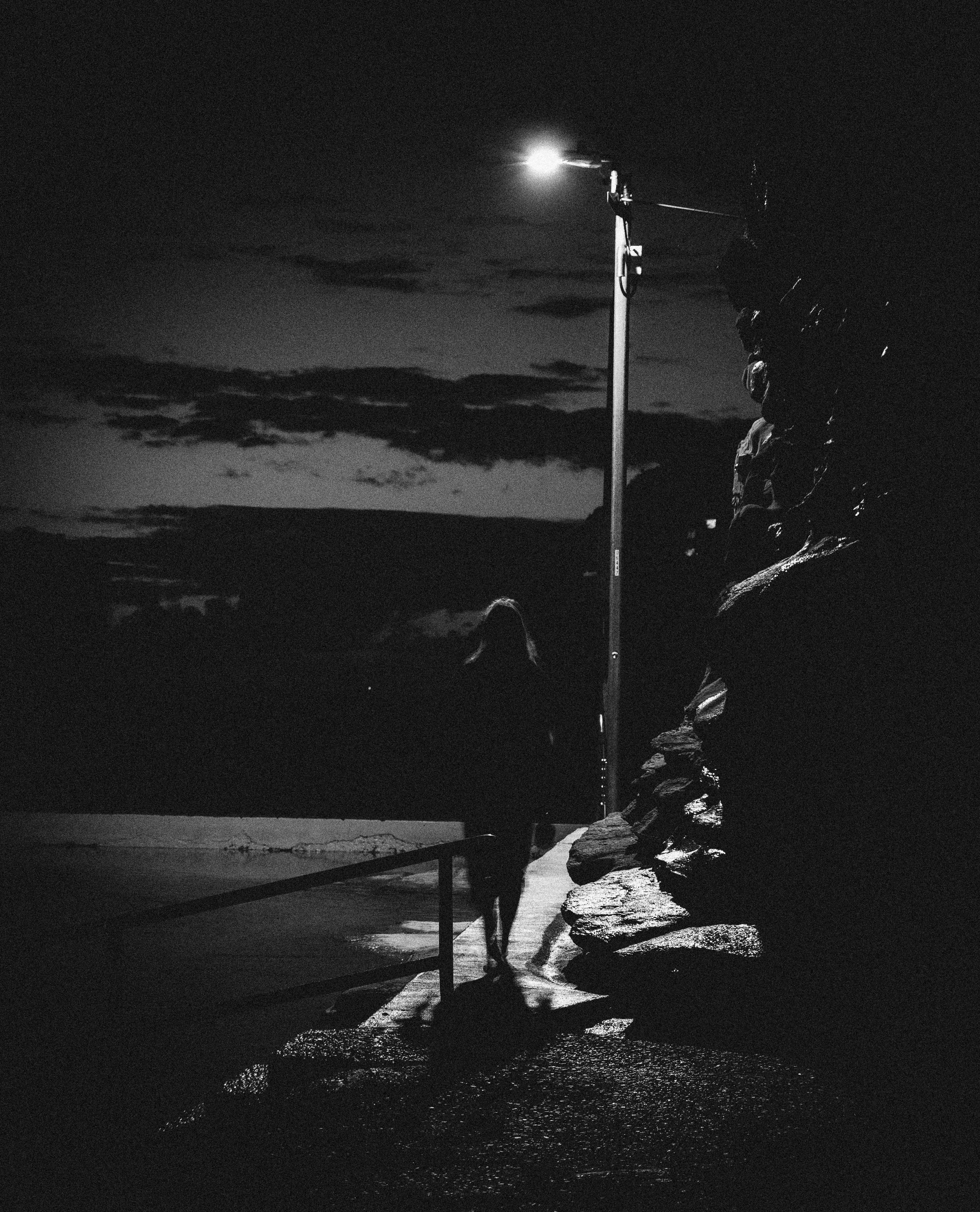 Fashion photoshoot with a woman posing in a dress