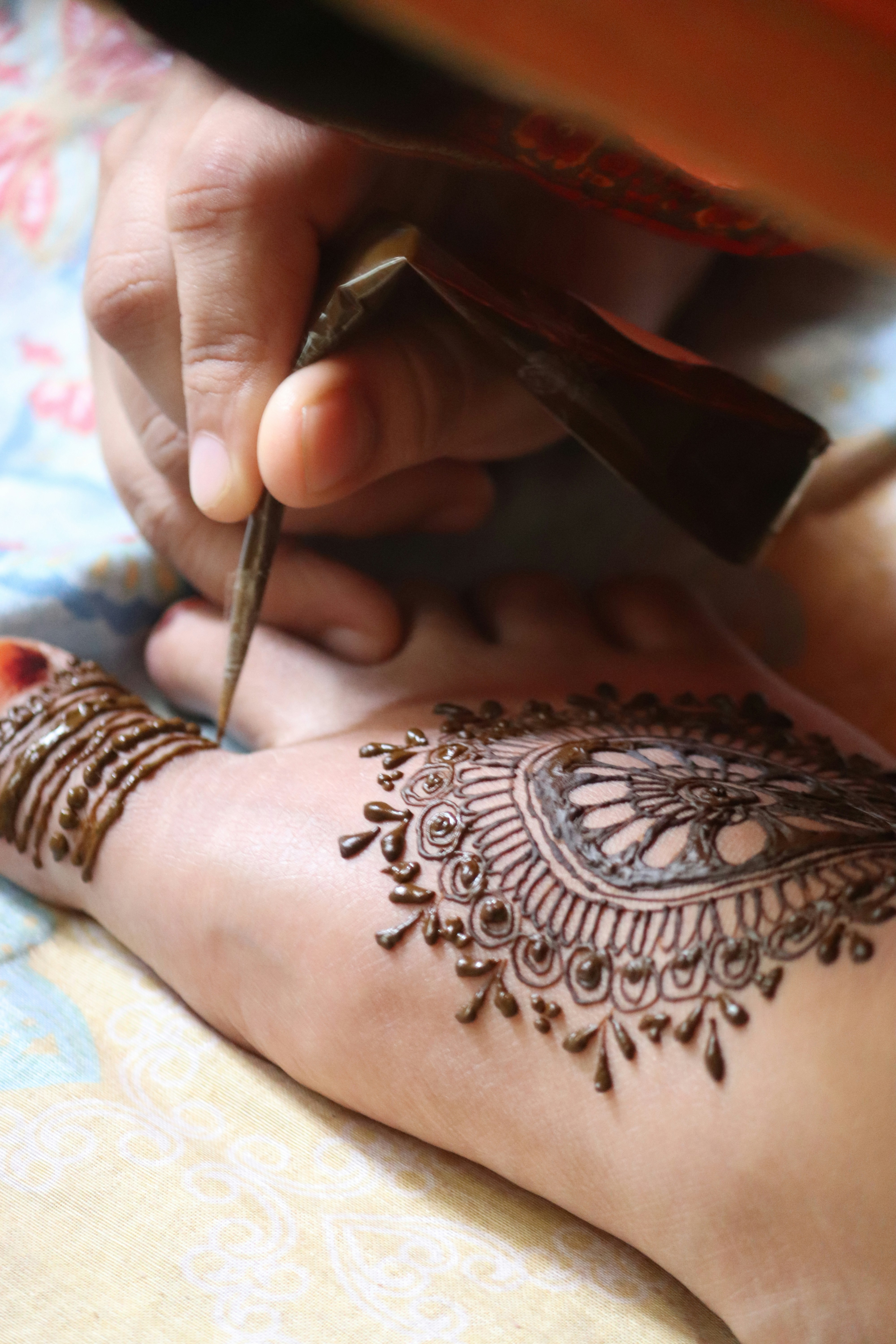 a person cutting a snake