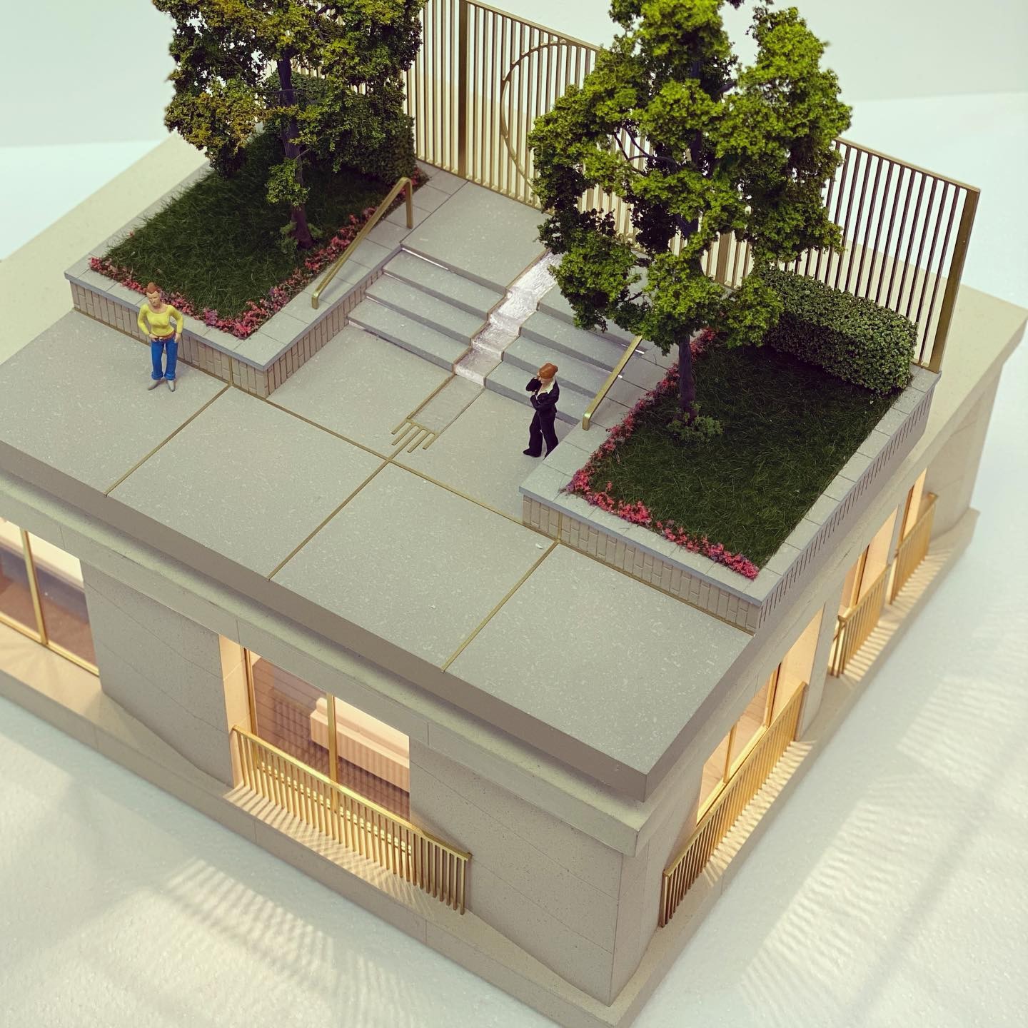 Miniature model of apartmnet with a walkable park zone on the roof