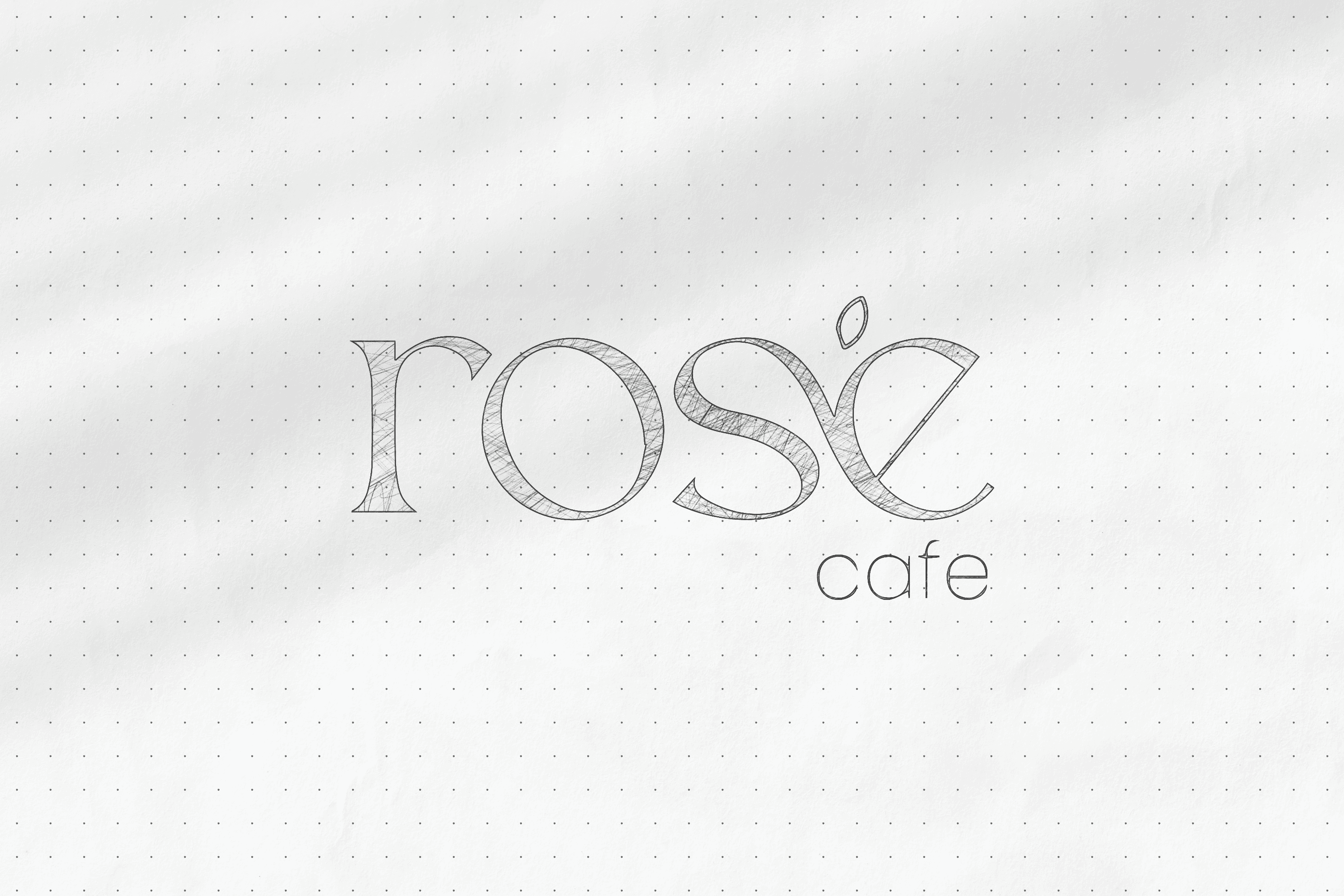 Rosé Café logo sketch on dotted paper