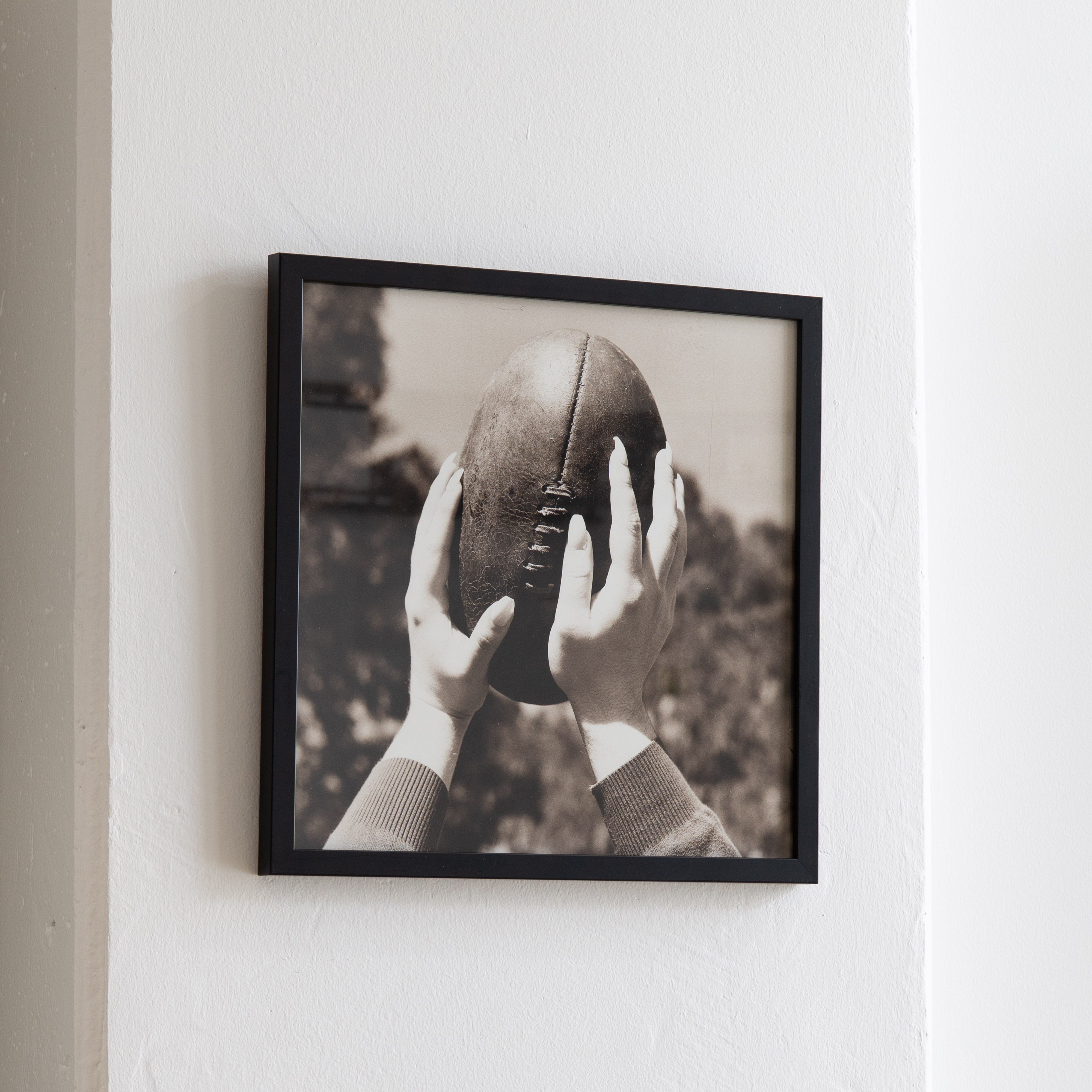 Darkroom prints drying on wire racks