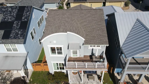 Drone view: Austin architectural shingle roof with curved front