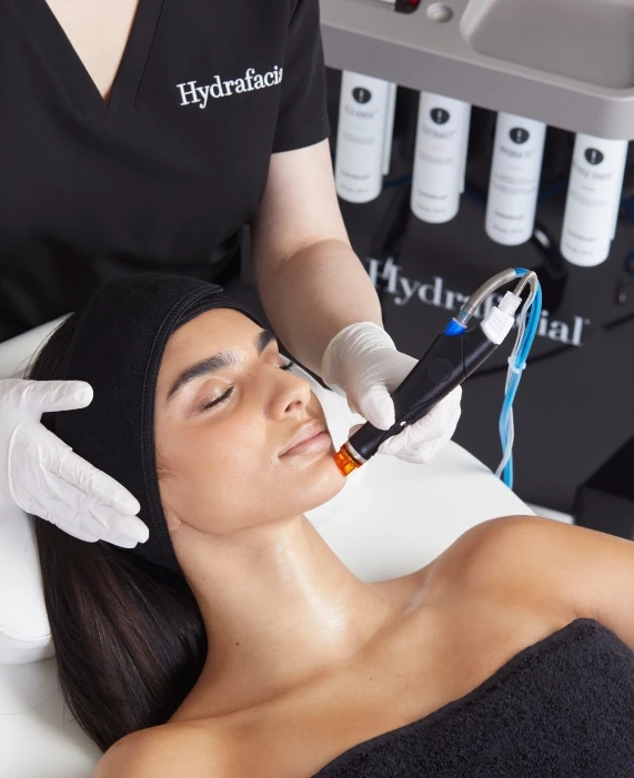 A Woman getting a hydra facial