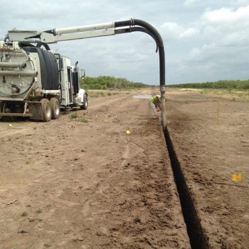 hydro truck blasting dirt