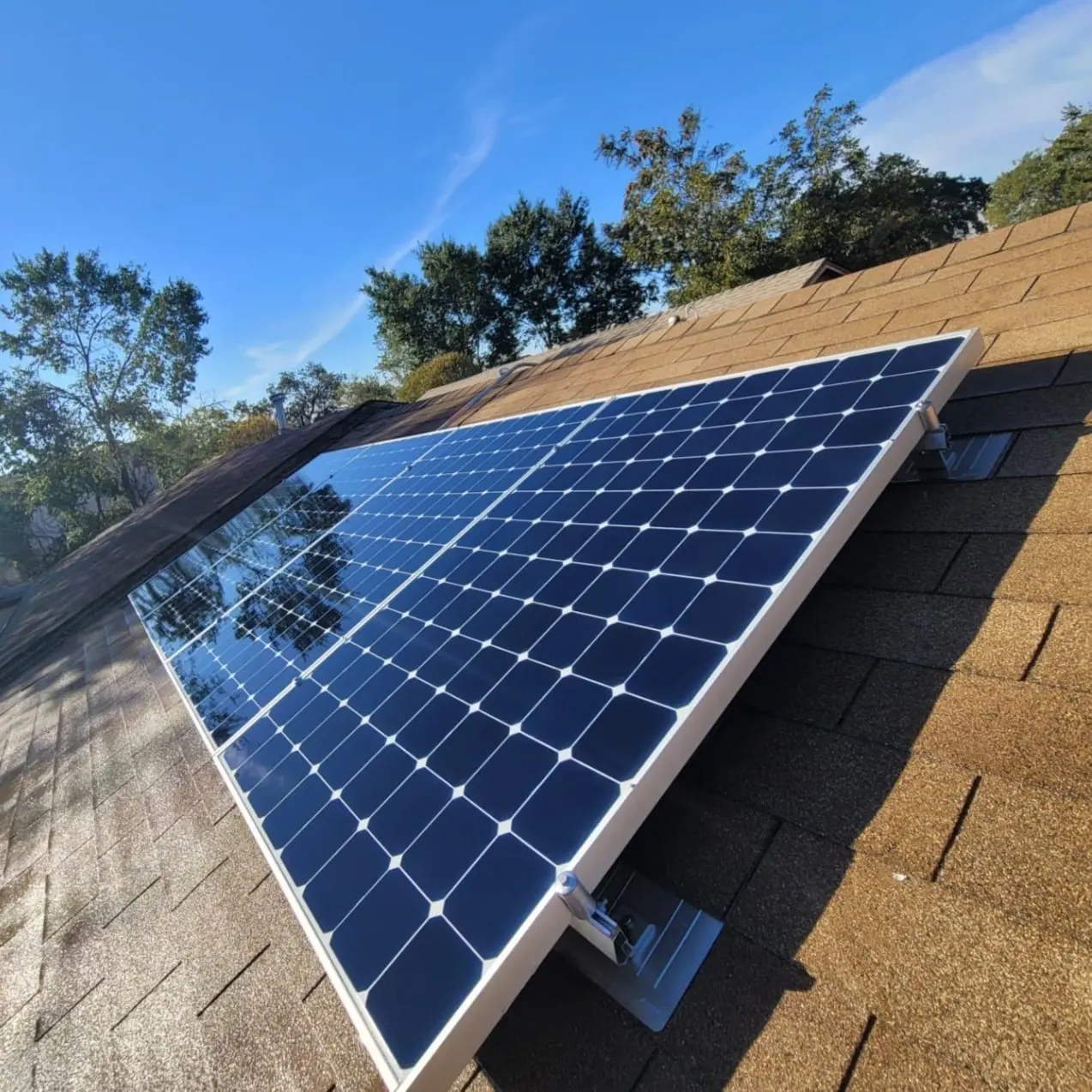 Clean residential solar panels on a tile roof | Premier Solar Service, serving Tracy, CA