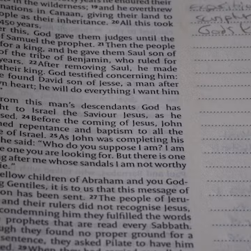 An open book with writing on it