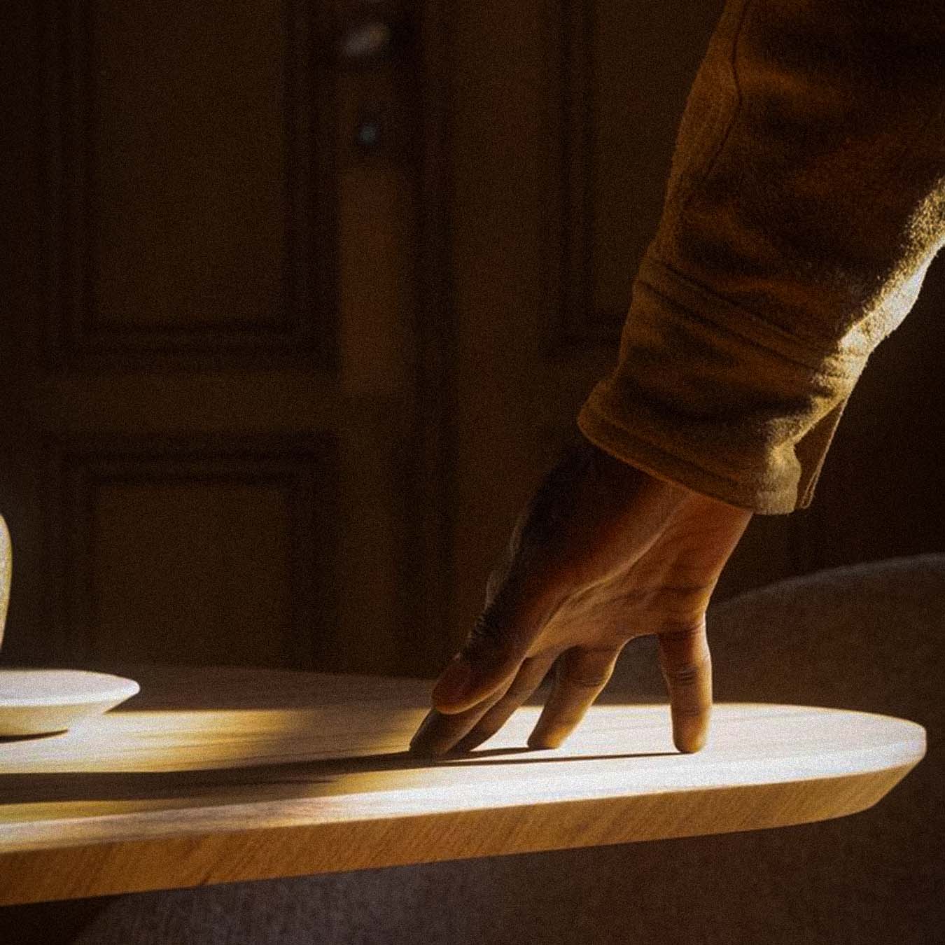 black laptop computer on white textile