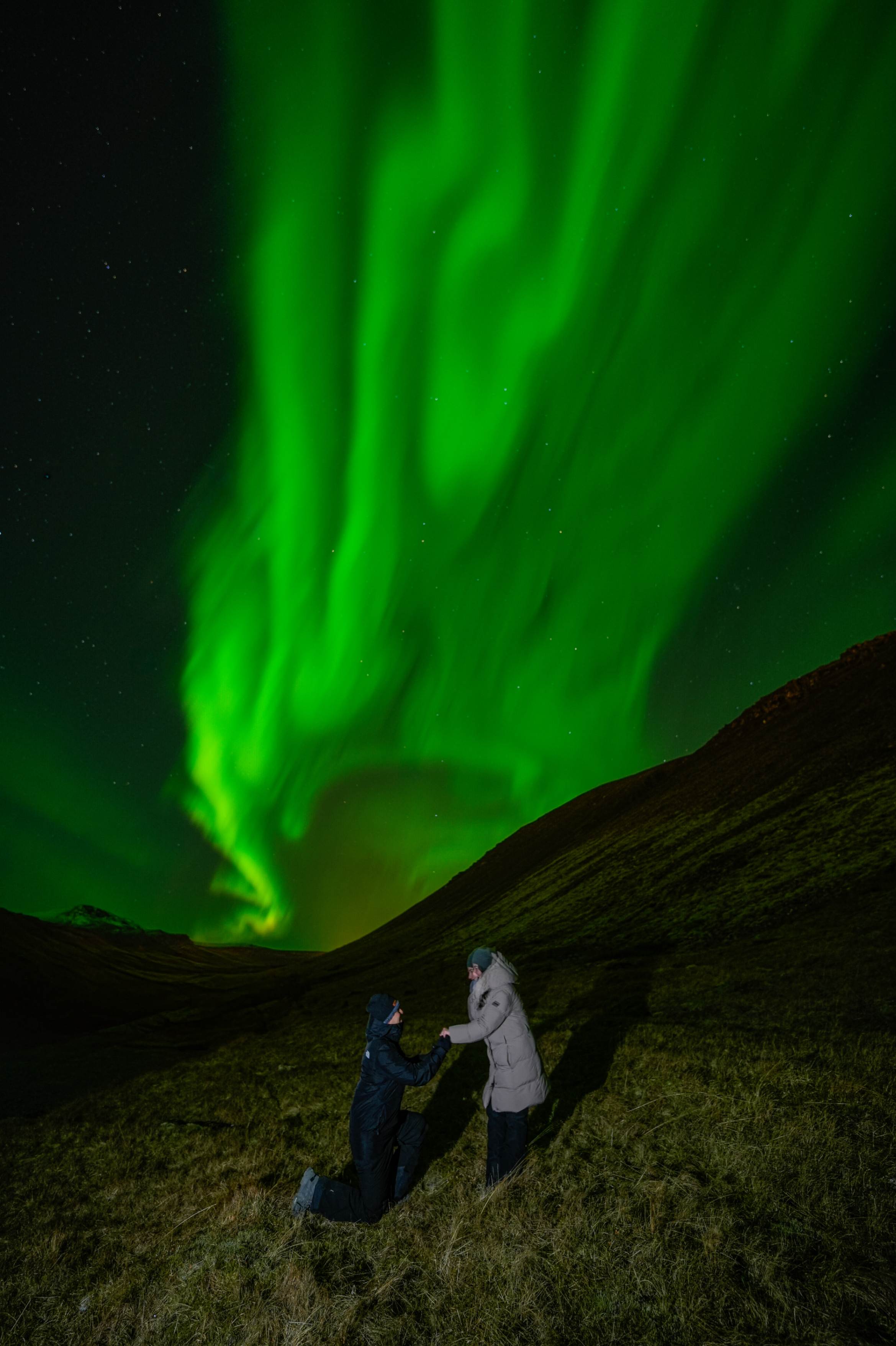 Northern Lights tour photography from Aurora Experts in Iceland, featuring guests beneath the aurora, winter landscapes, and vivid skies over remote Icelandic locations.