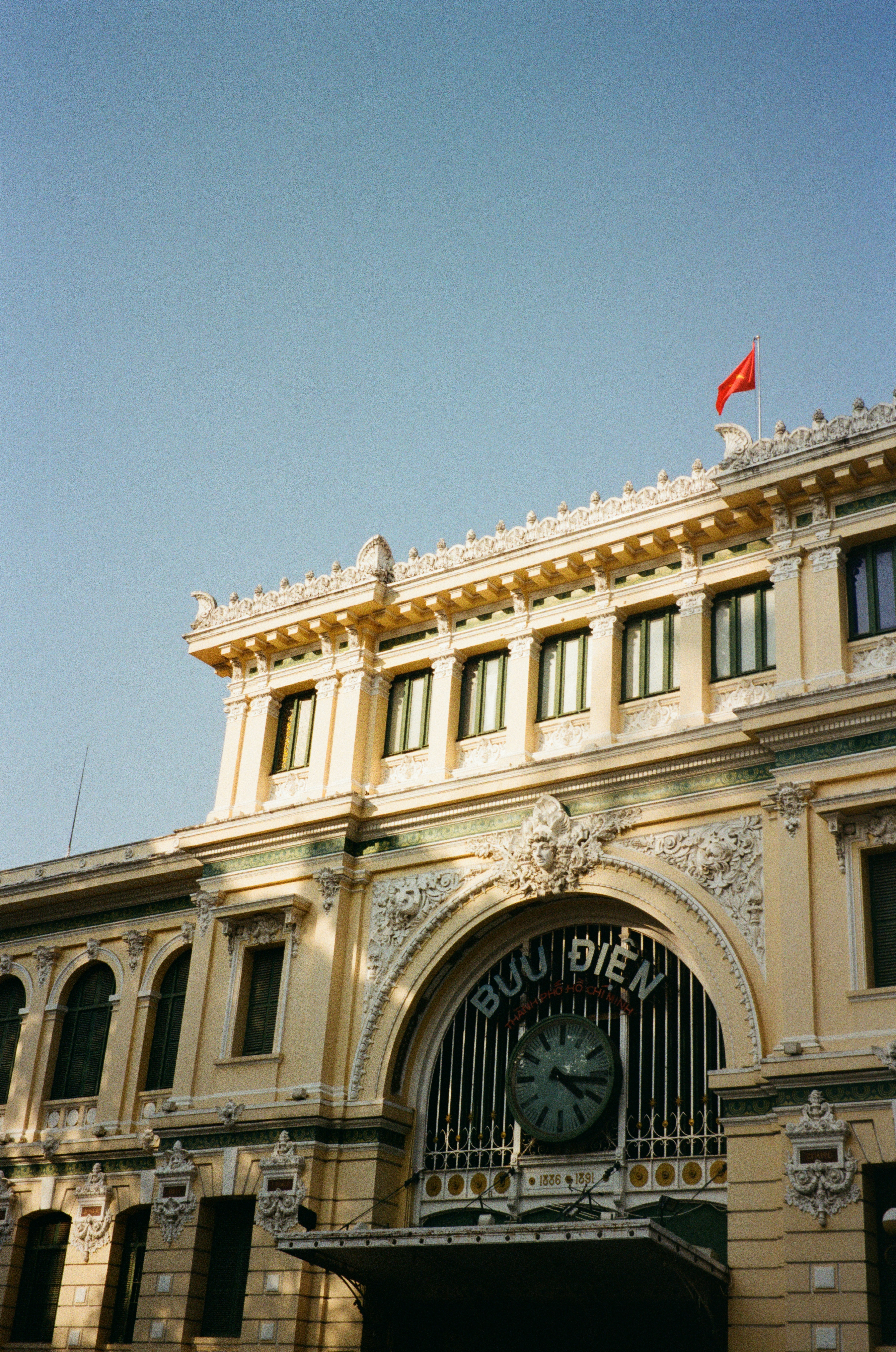 a large building with a clock on the front of it