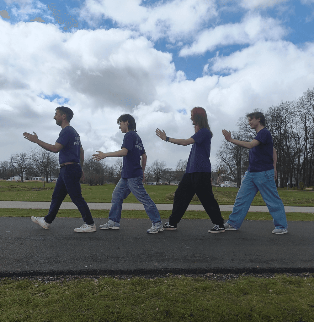 DDI team recreating the famous Beatles Abbey Road street crossing pose