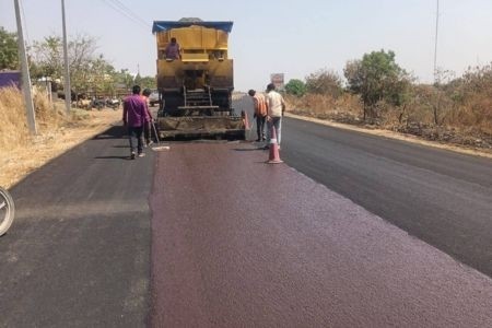 Microsurfacing application on an existing road