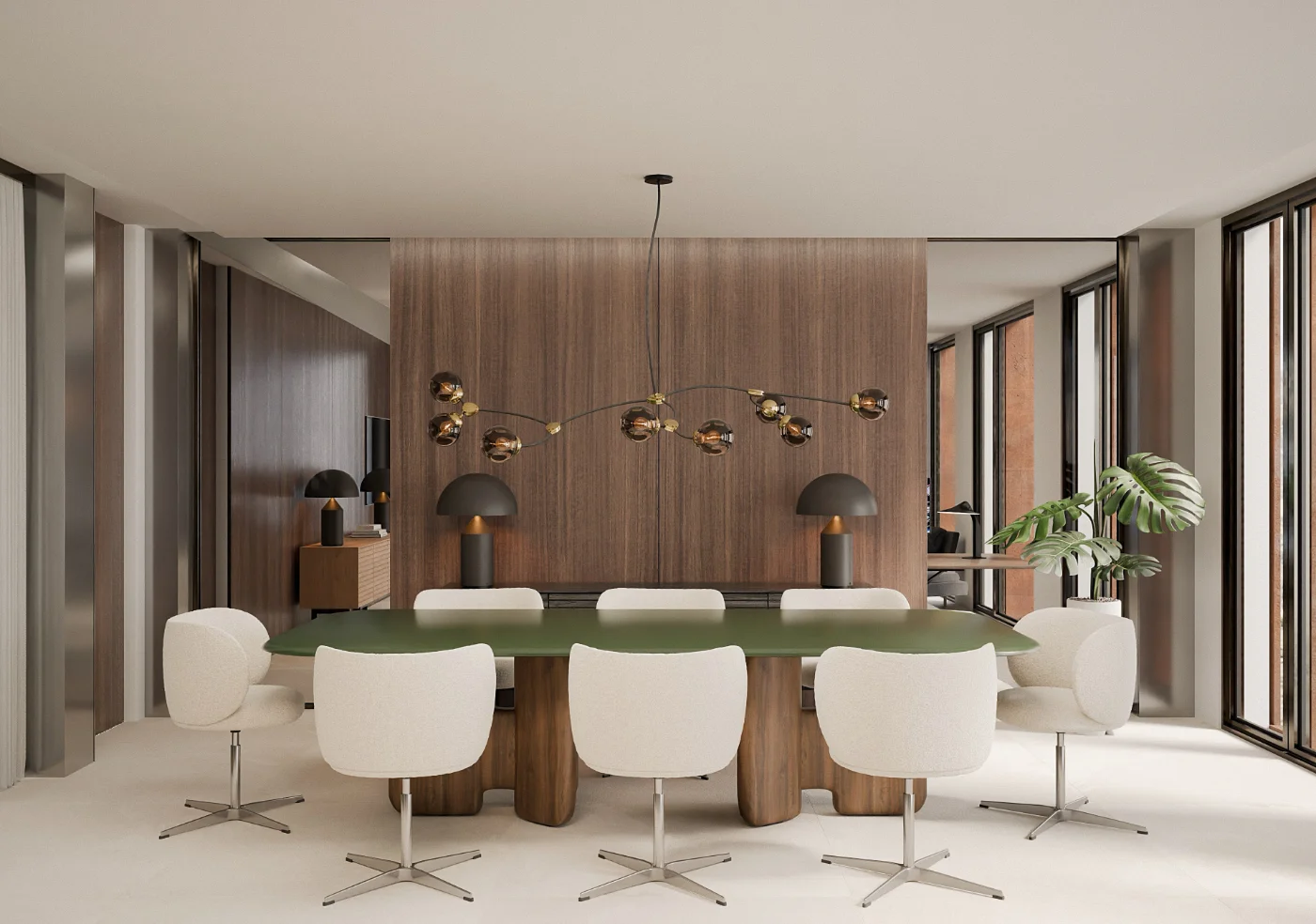 A close-up of a hand wearing multiple decorative rings against a blue background.