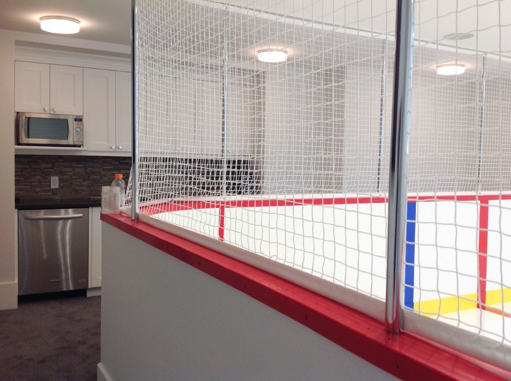 Image of KHD Homes design-build kitchen with custom layout design and home renovations including sport court area.