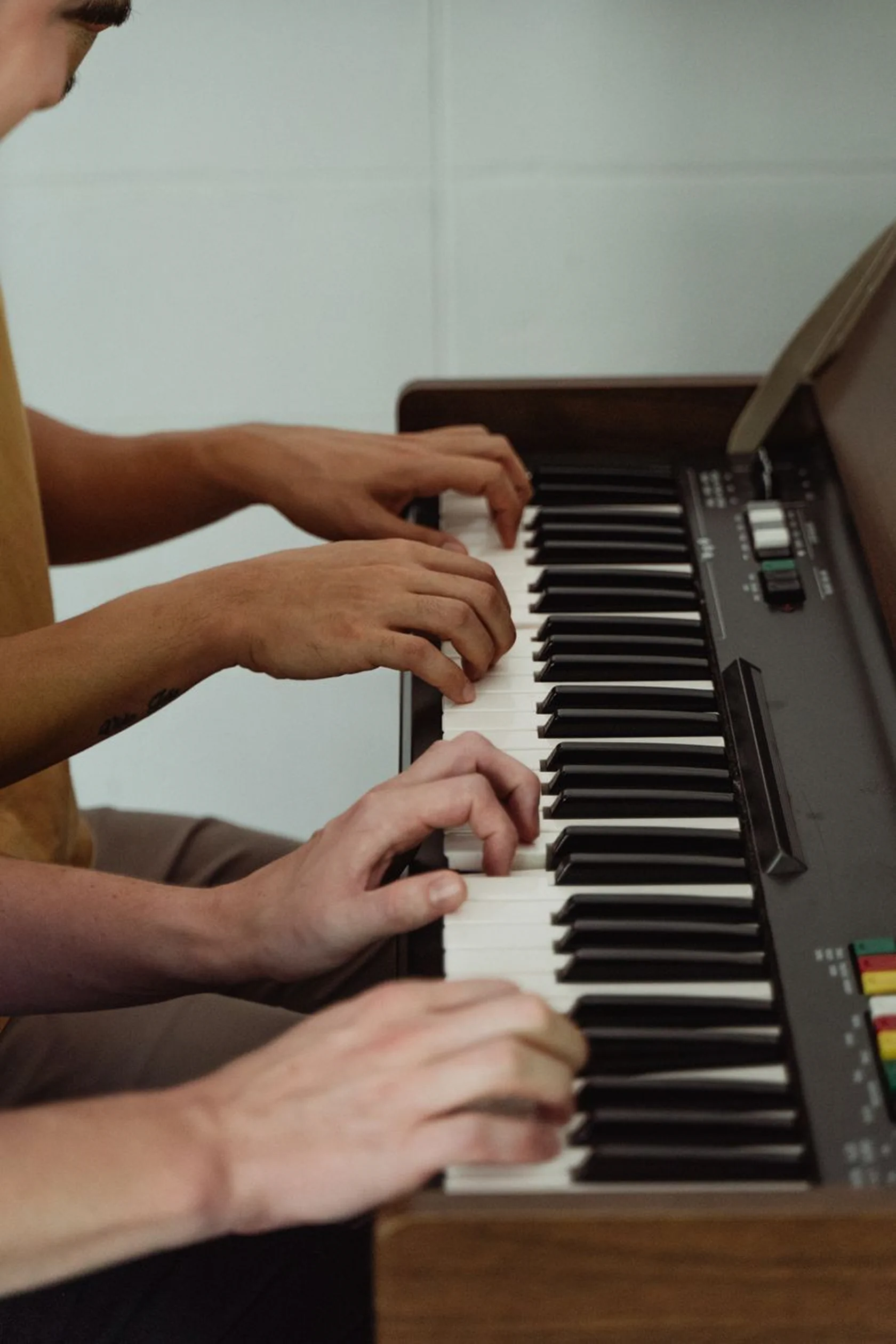 Student developing music skills during a lesson