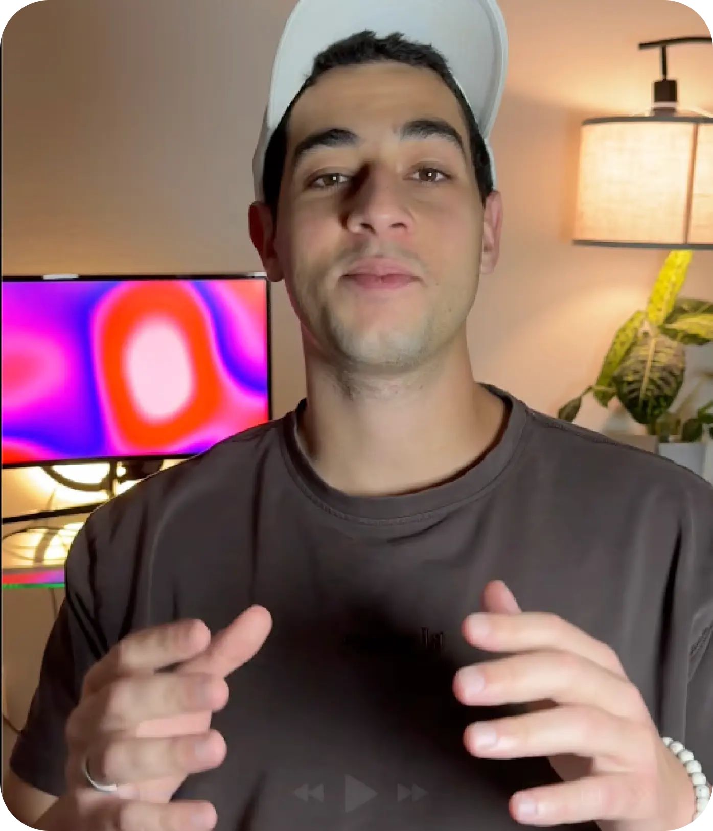 man standing beside wall