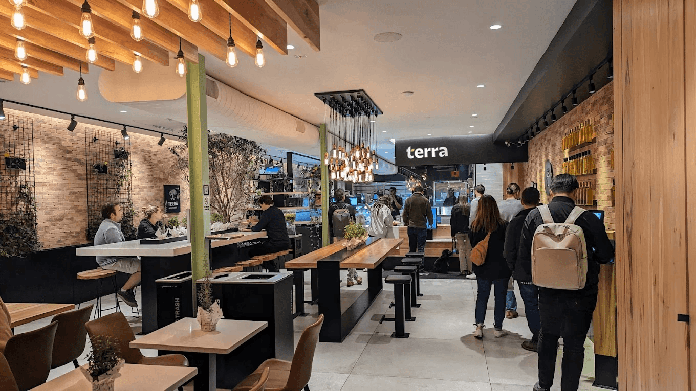 Terra fast-casual restaurant branding across storefront, packaging and digital touchpoints