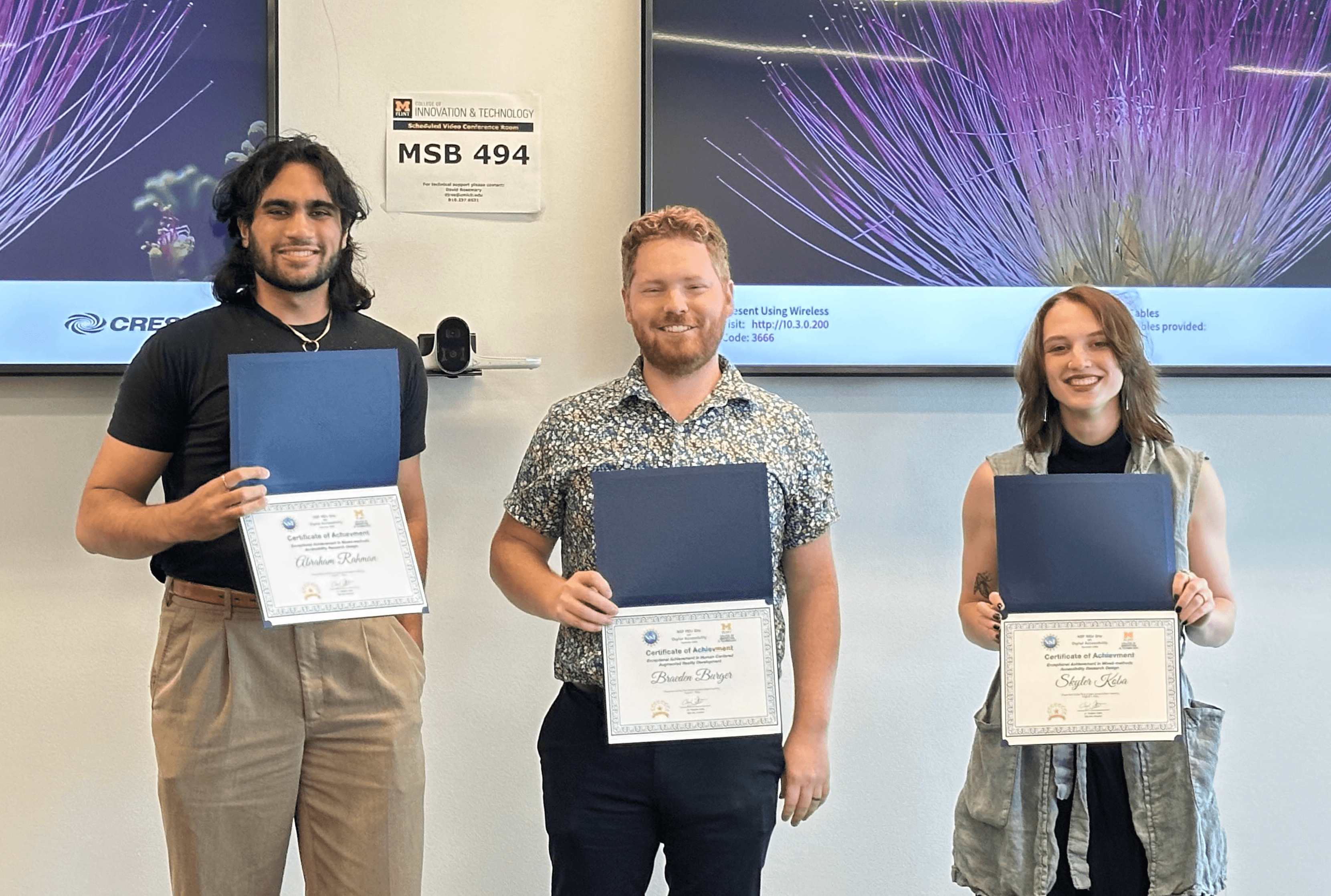 An picture of the Pothole Team holding their certificates with Abraham Rahman on the left, Steve Wilson in the middle, and Skyler Koba on the right.