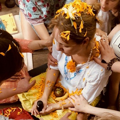 smiling woman wearing brown scarf and maroon coat on snow field