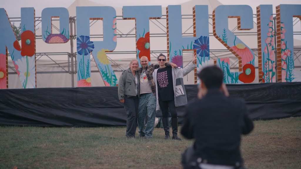 Photographer at a music festival is taking pictures