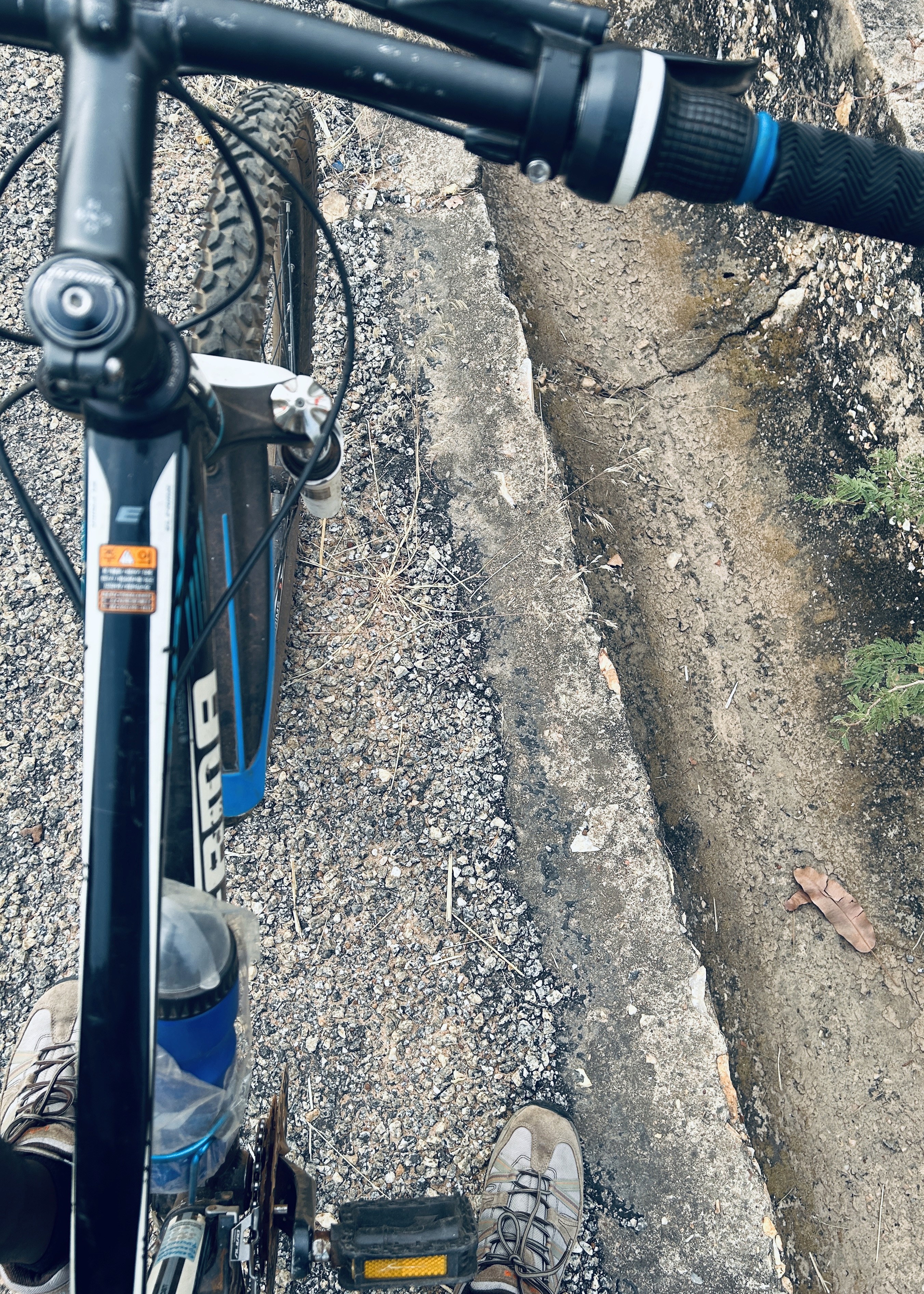 a group of people walking on a sidewalk