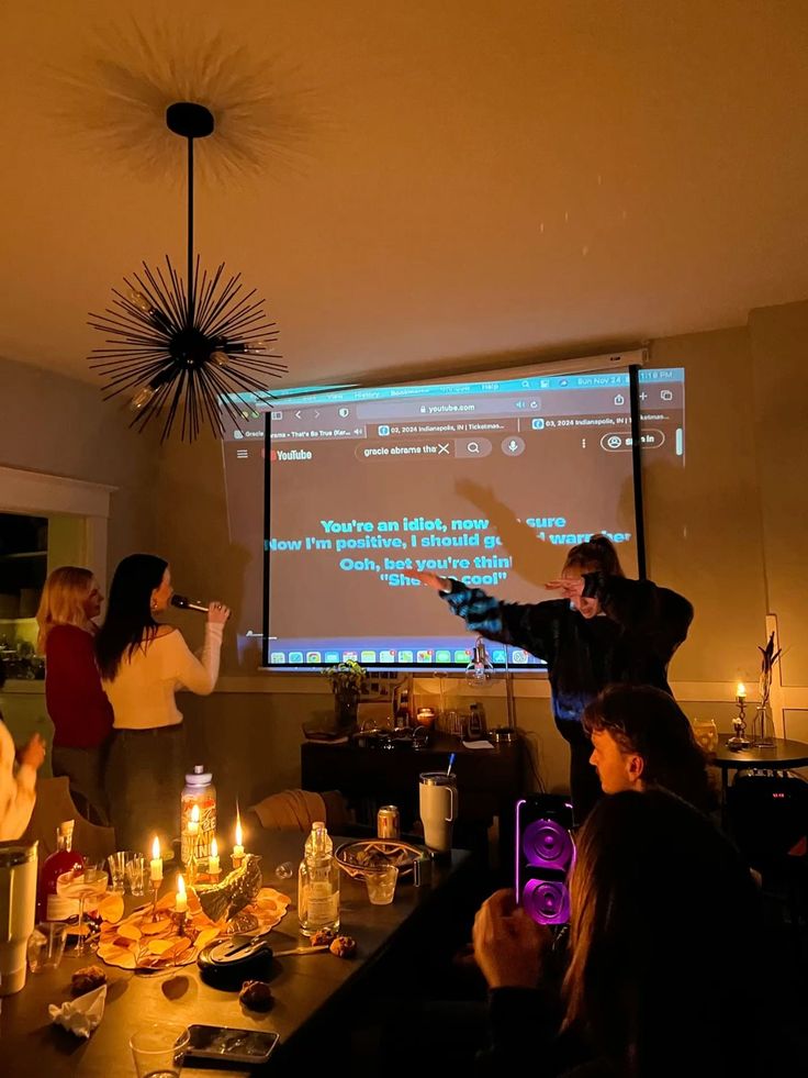 men sitting in front of their laptop computer