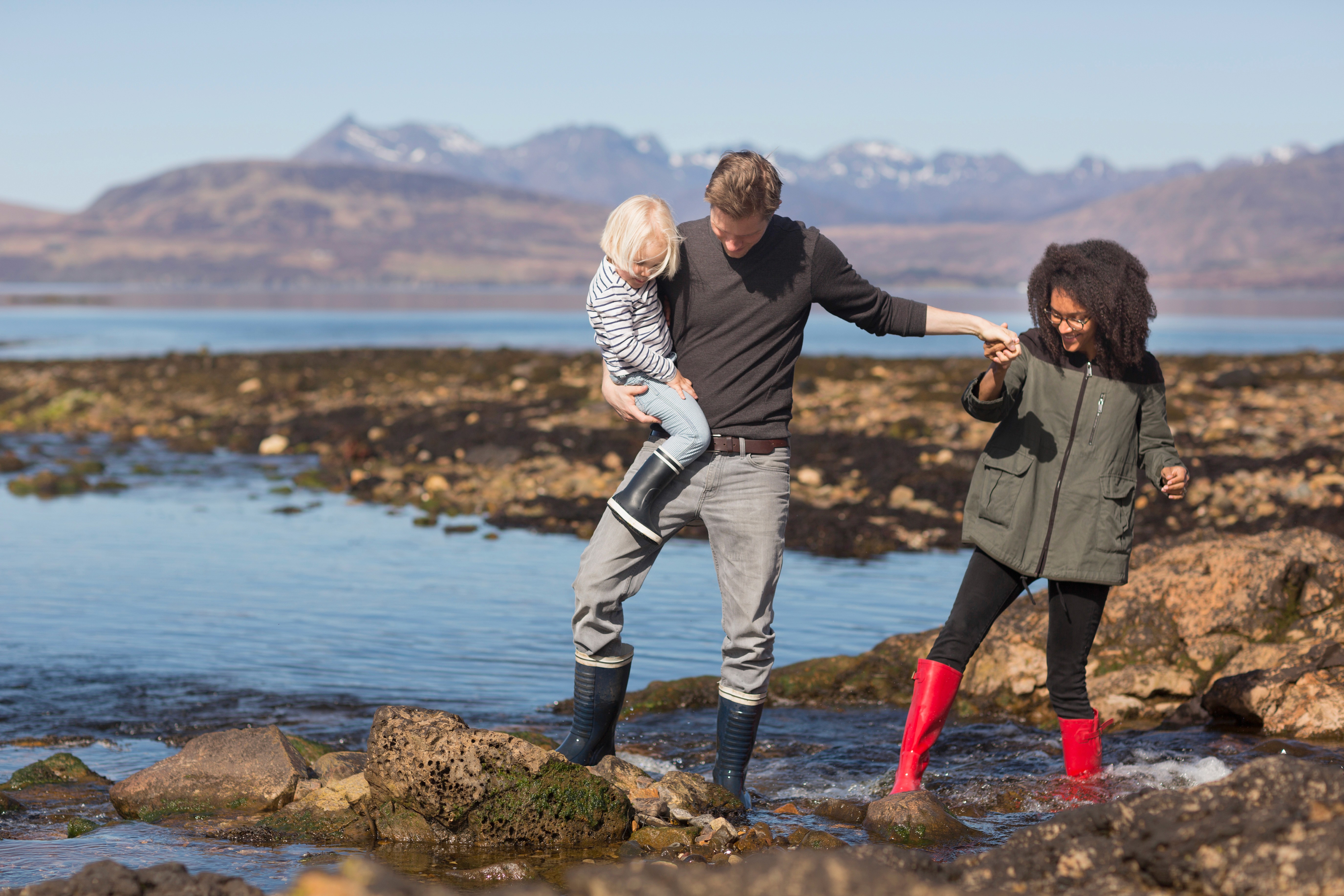 family in water in iceland
