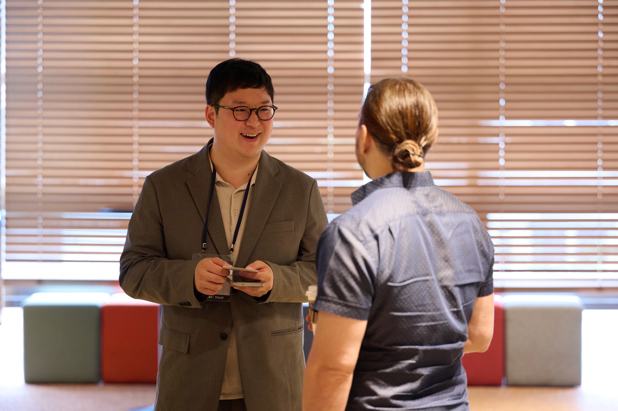 a man holding a microphone in his hands