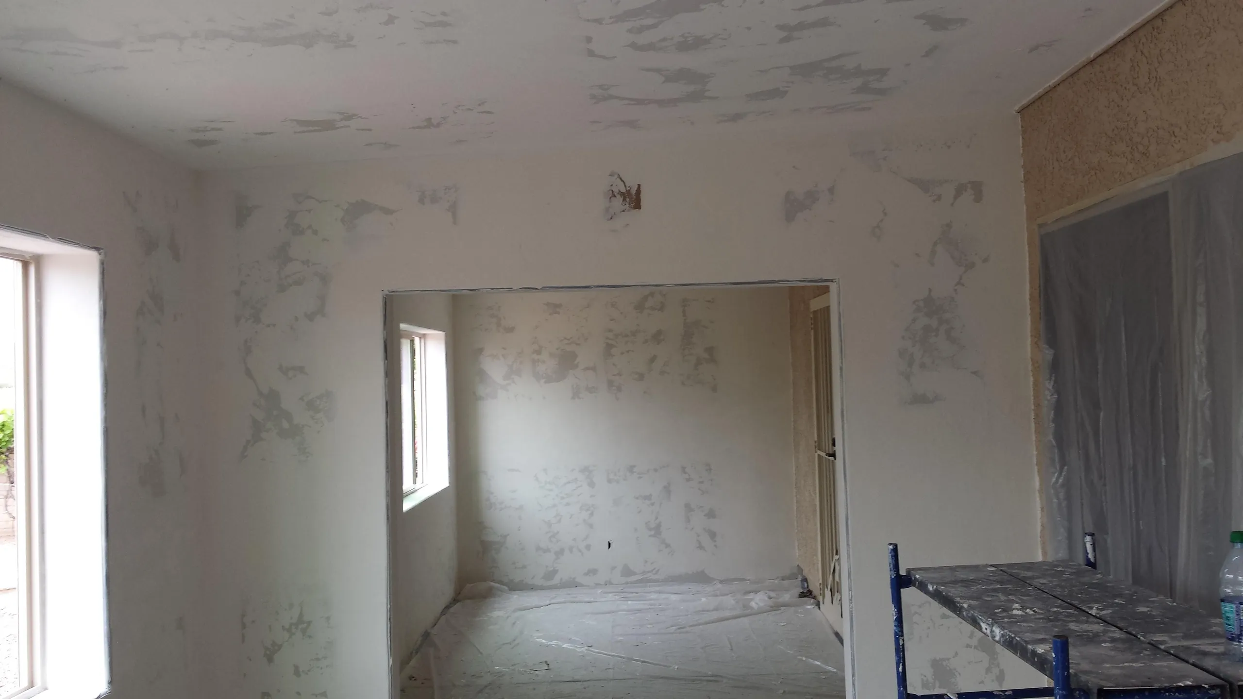 Drywall installation and finishing on a Tucson remodel