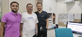 Dr Aloy With Patient