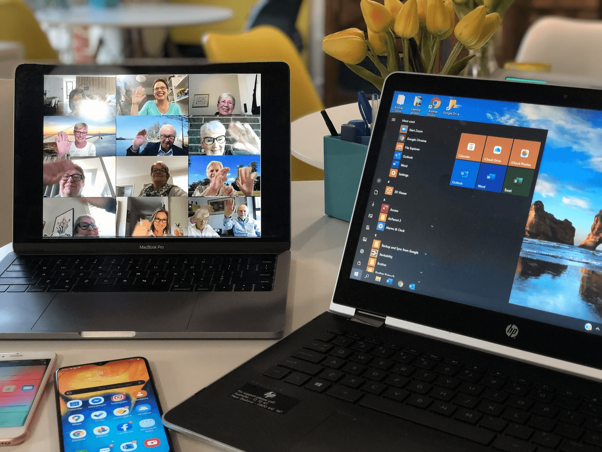Two laptops and smartphones on office desk - Repurpose Webinar Content
